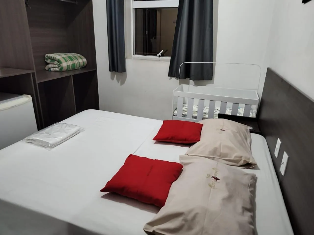 Bed in Center Plaza Hotel