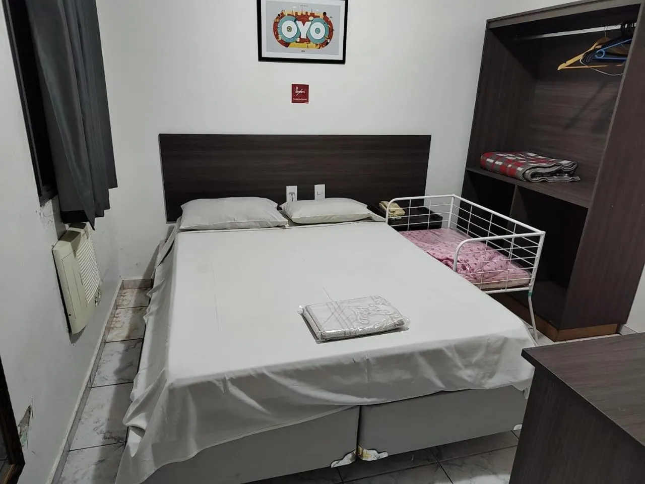 Bed in Center Plaza Hotel