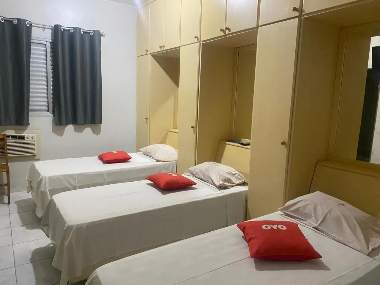 Bed in Center Plaza Hotel