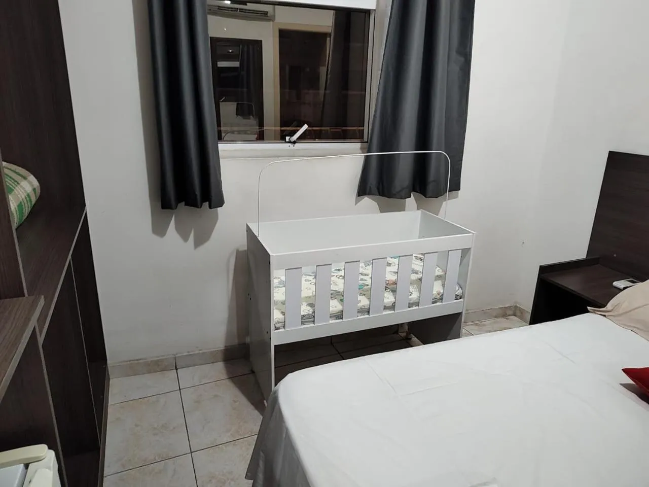 Bed in Center Plaza Hotel