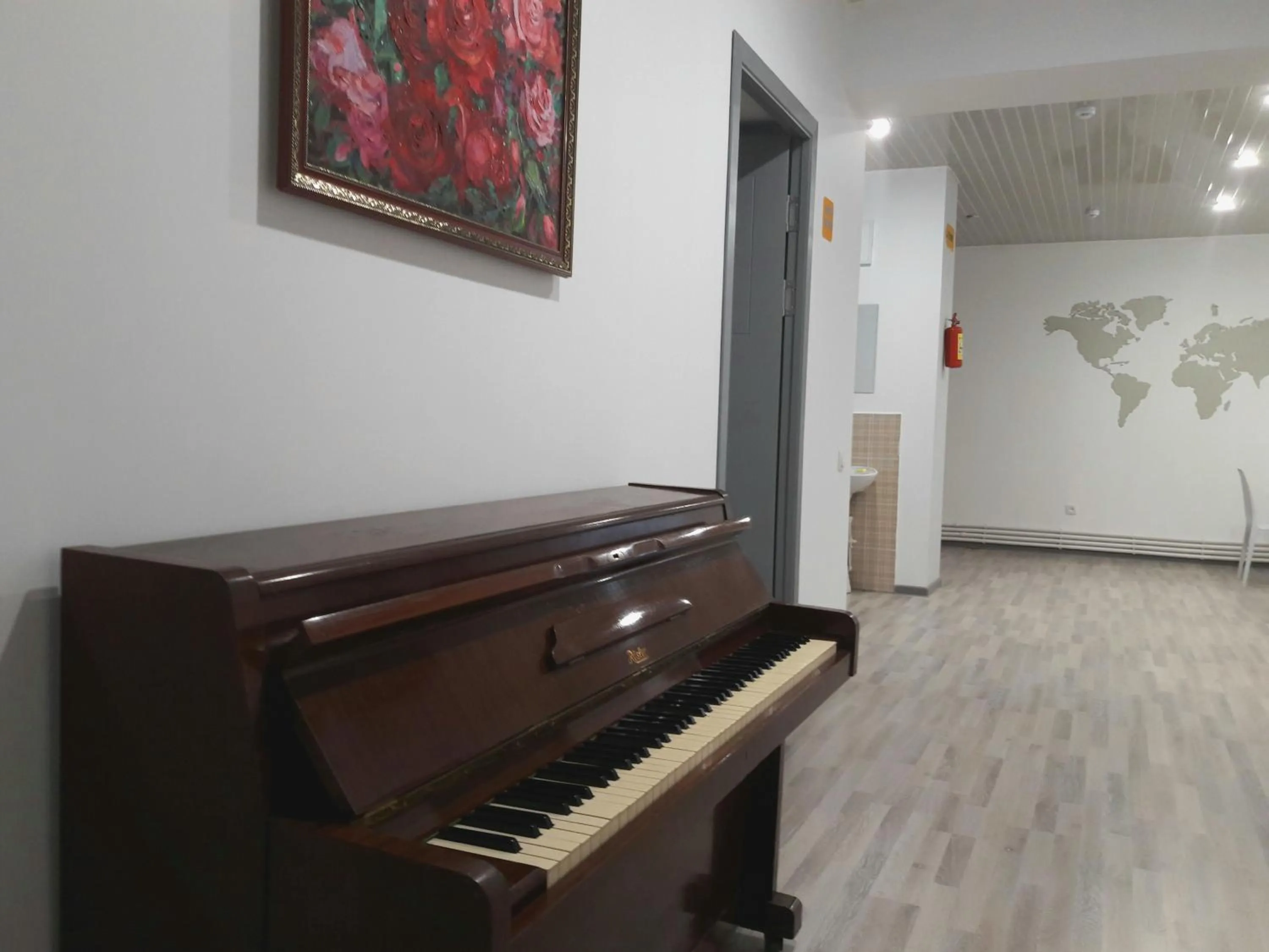 Communal lounge/ TV room in Jules Verne Hostel