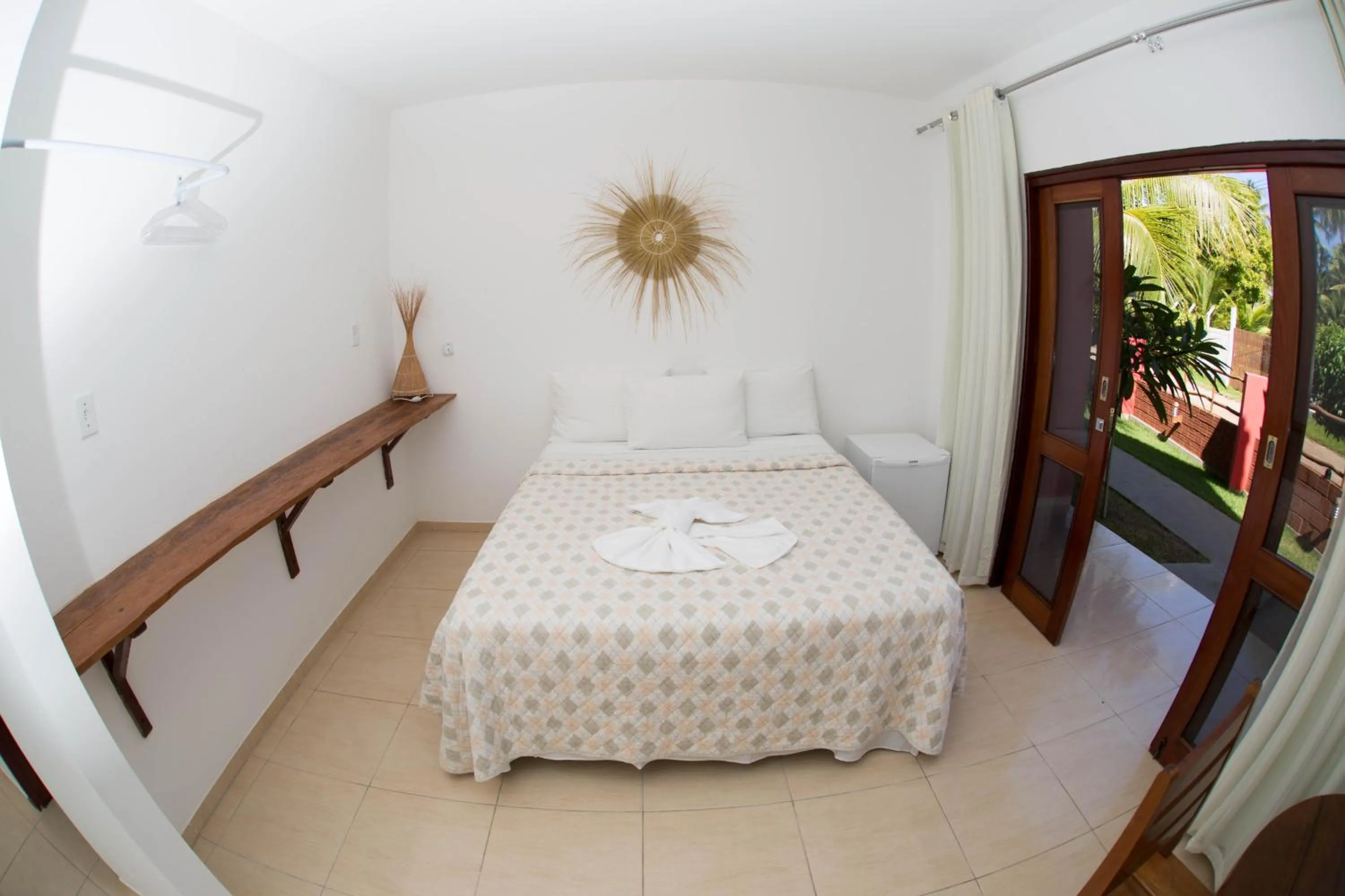 Bed in Pousada Recanto dos Milagres