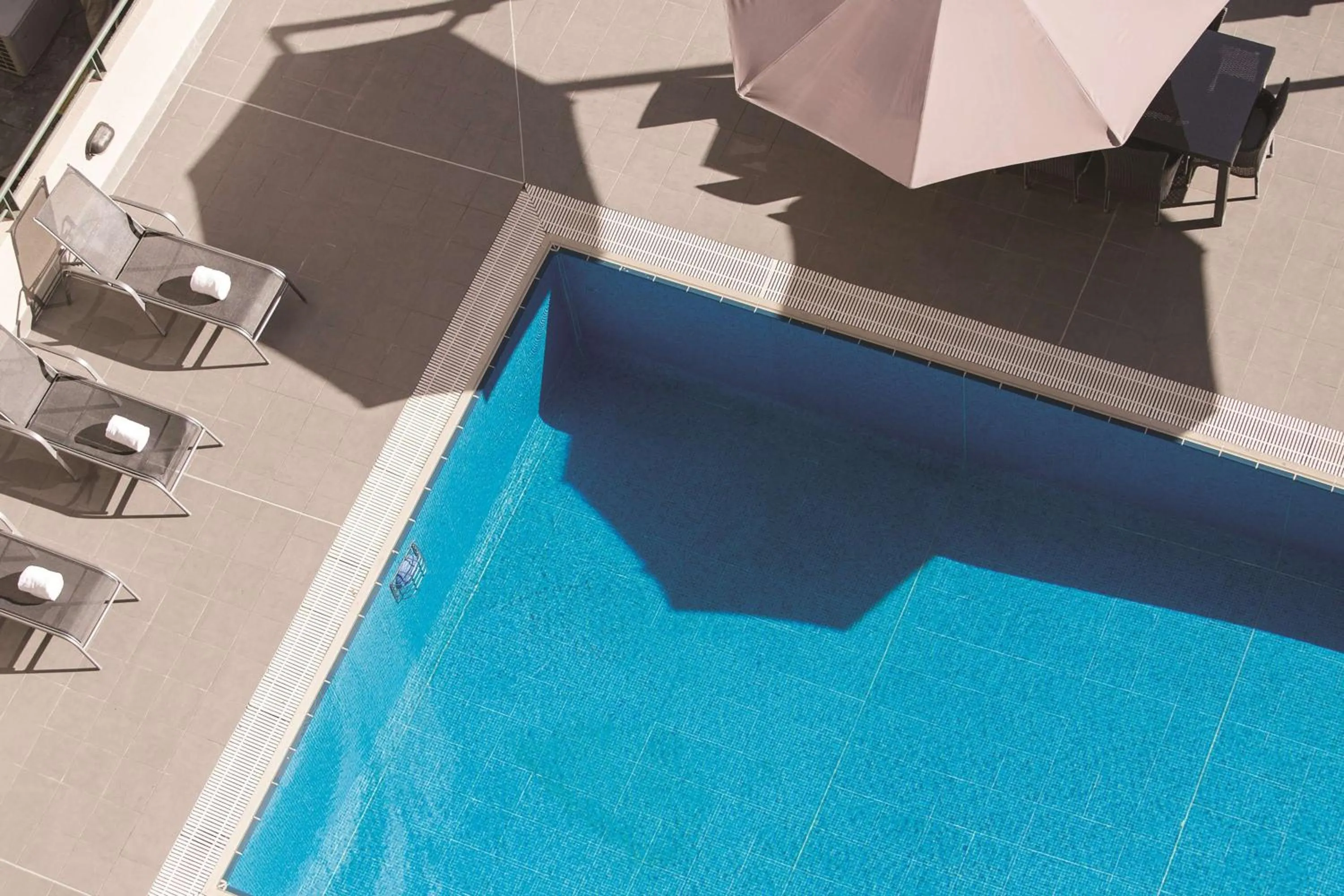 Pool view in Adina Serviced Apartments Canberra James Court