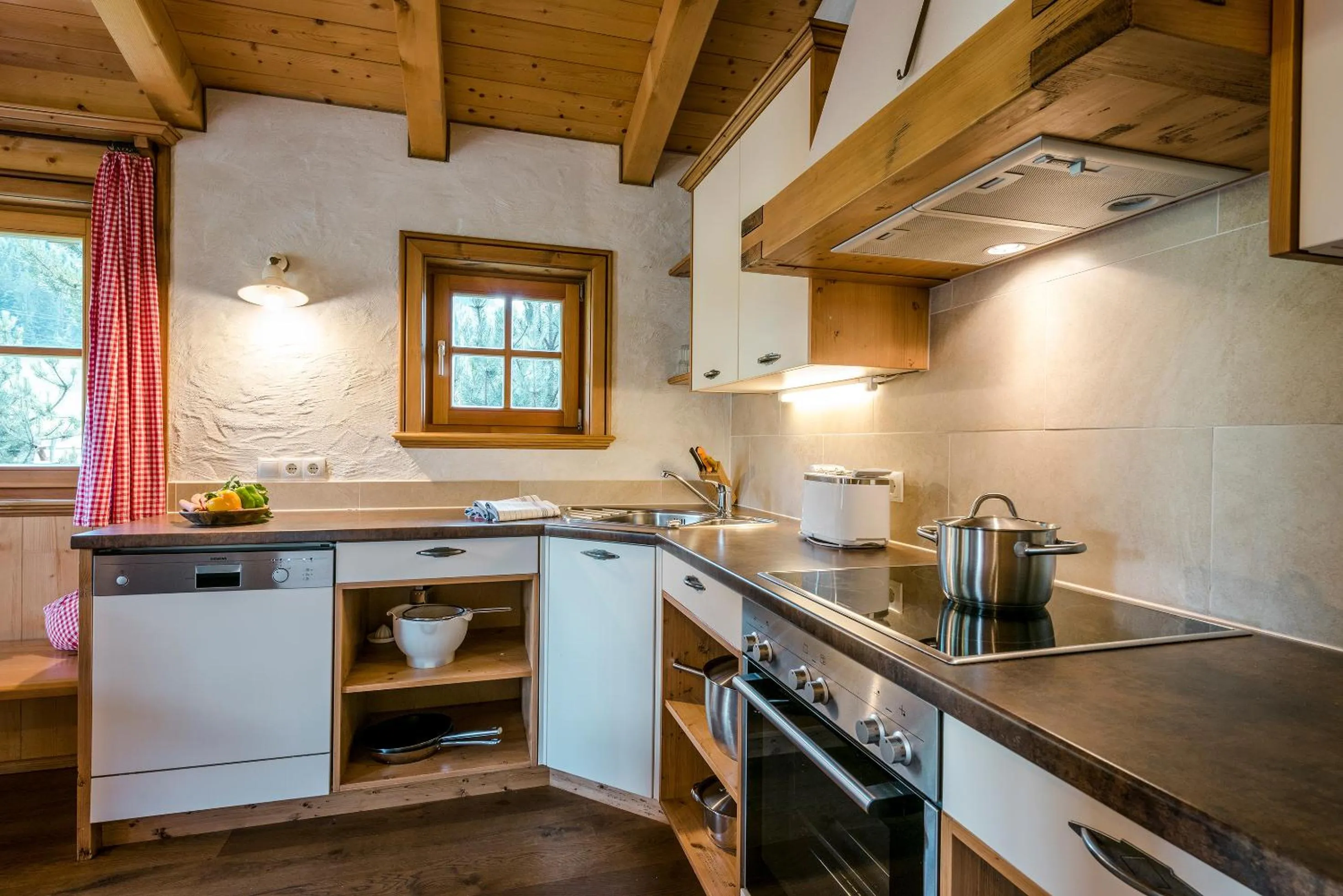 Kitchen or kitchenette in almlust - hotel, apartments, chalets