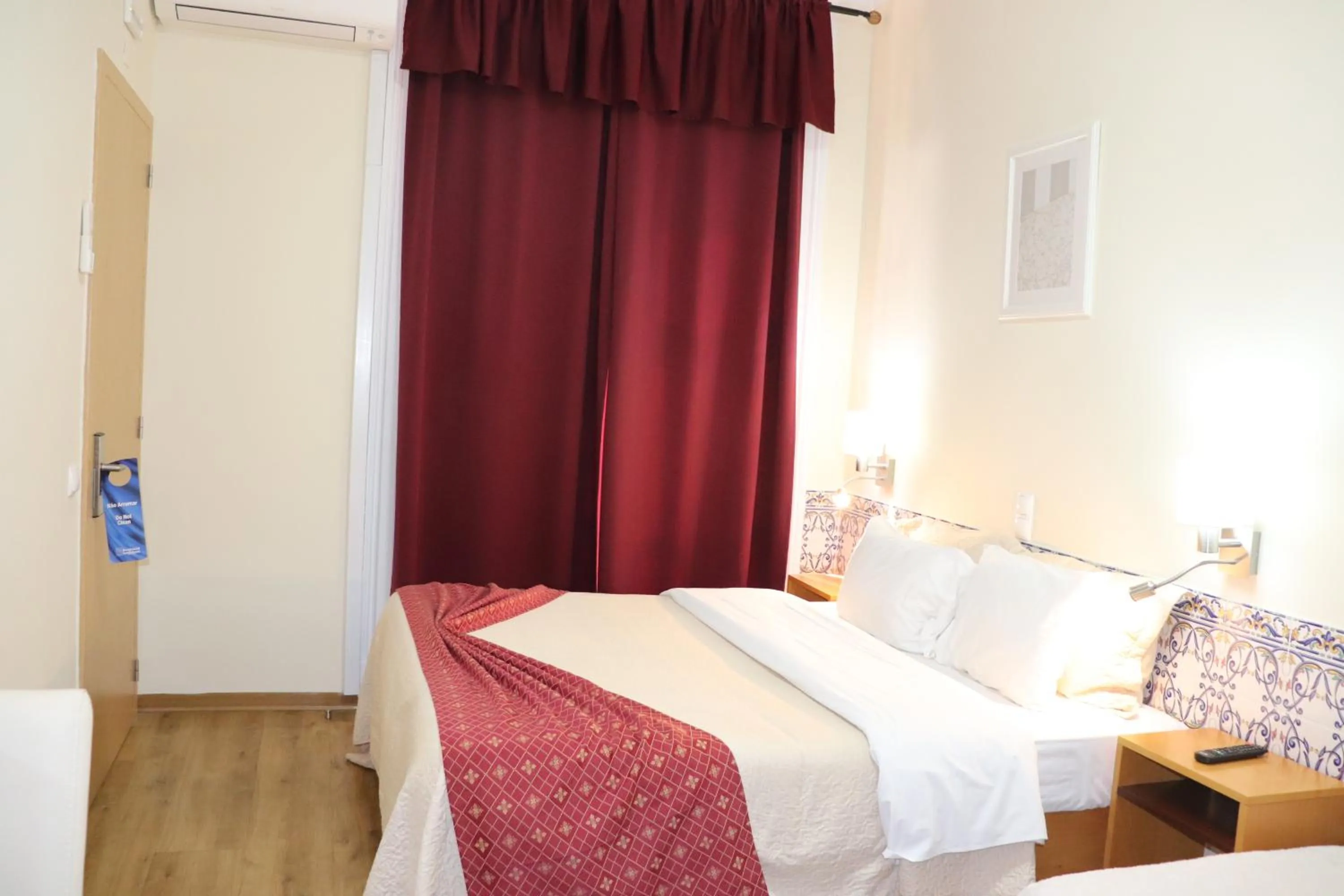 Decorative detail, Bed in Hotel Belém Tejo - Setubalense