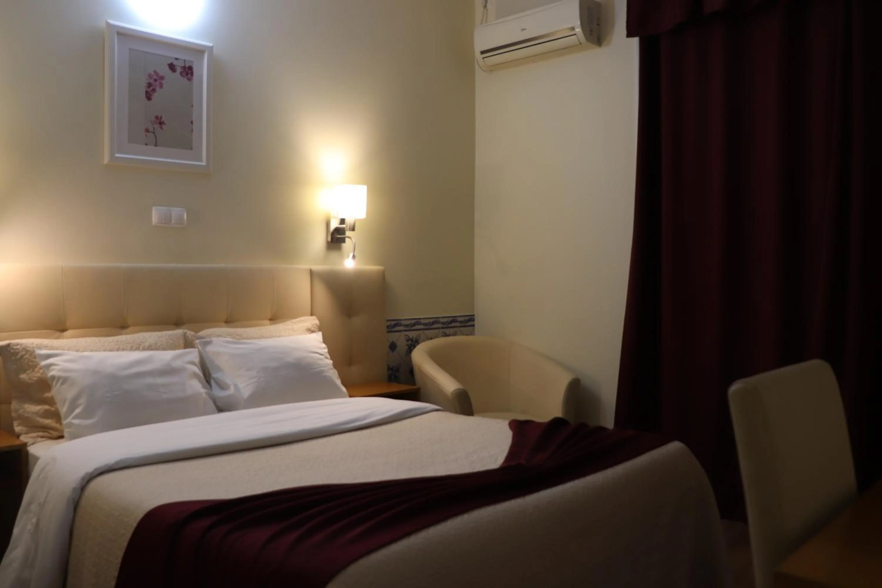 Photo of the whole room, Bed in Hotel Belém Tejo - Setubalense