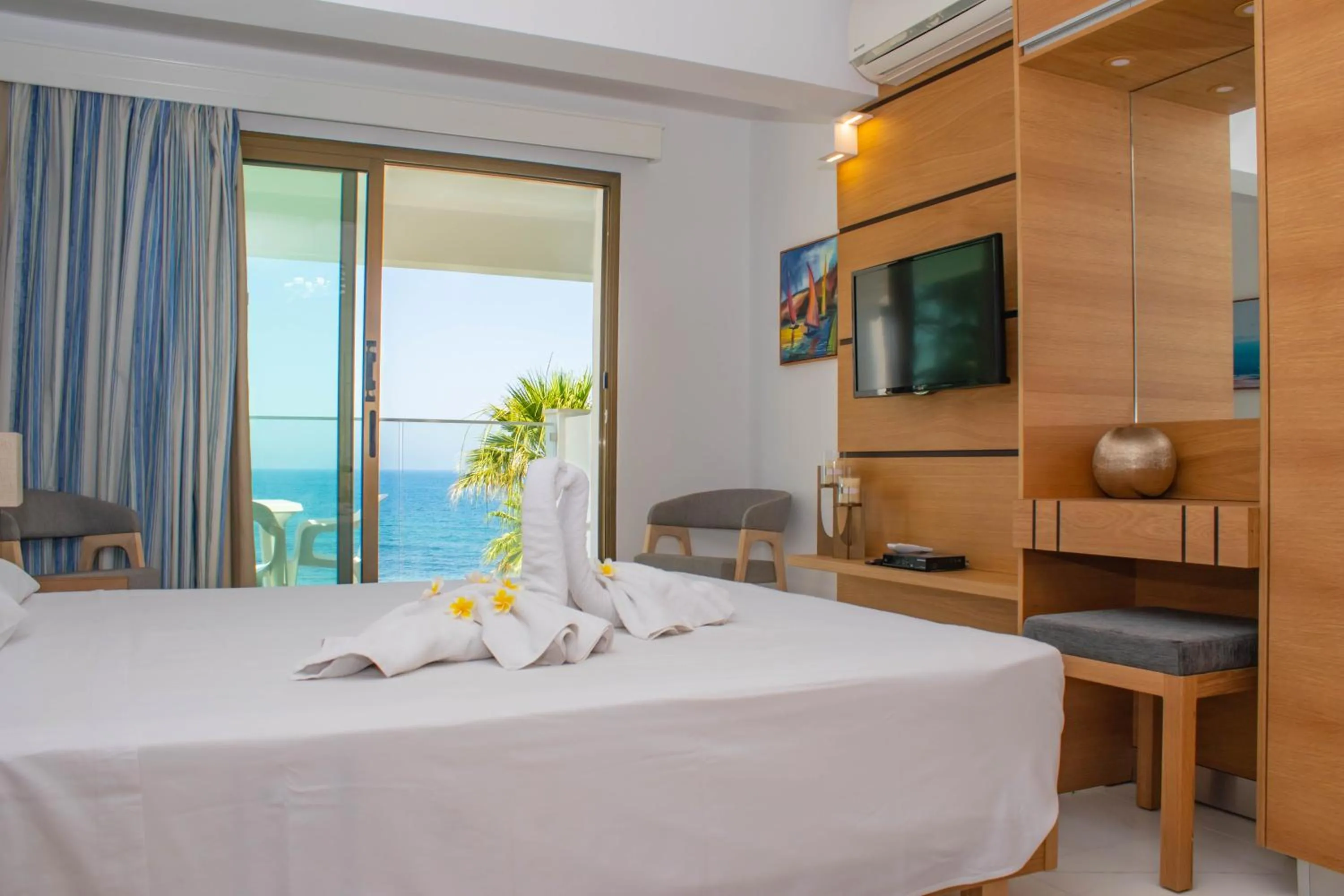 Bed in Rododafni Beach Apartments