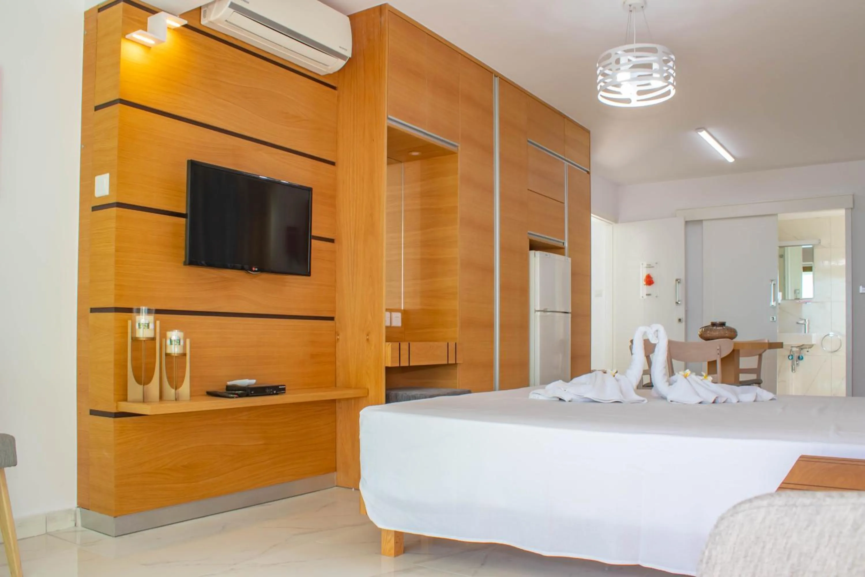 Bed in Rododafni Beach Apartments