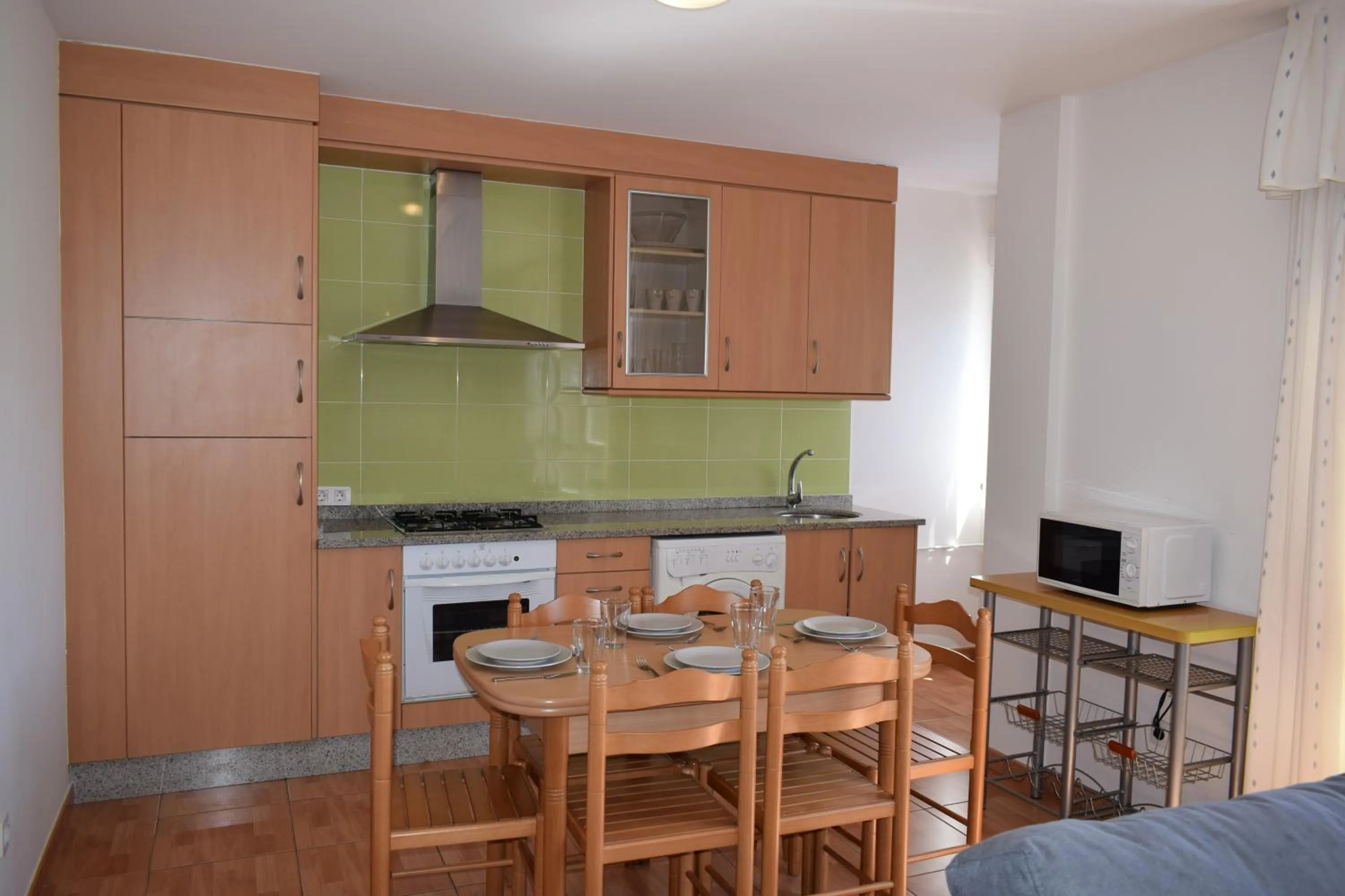 Kitchen or kitchenette in Apartamentos VIDA Corcubión