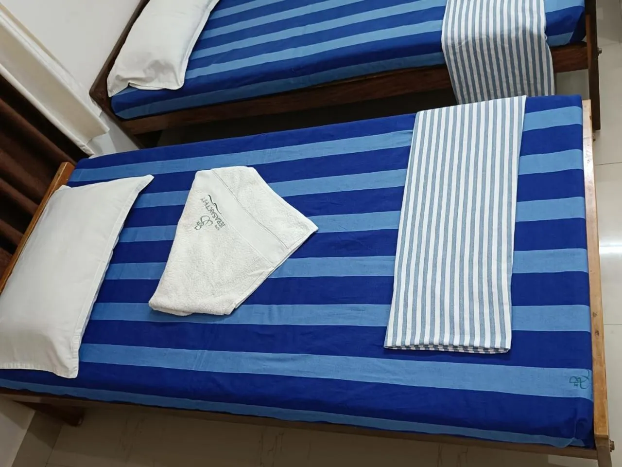 Bed in Hotel Jebasakthy