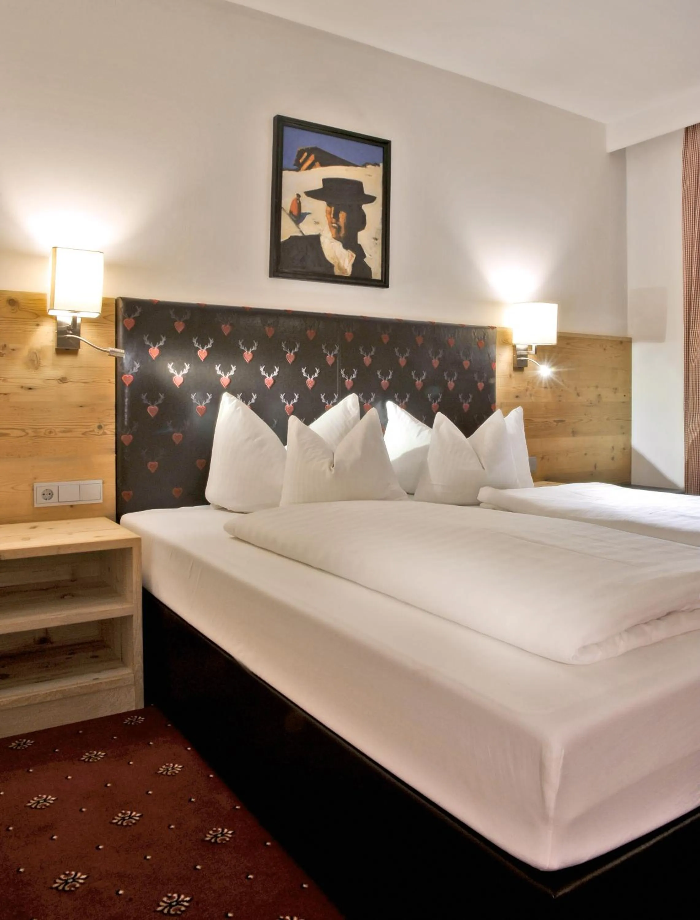 Bed in Hotel Tipotsch