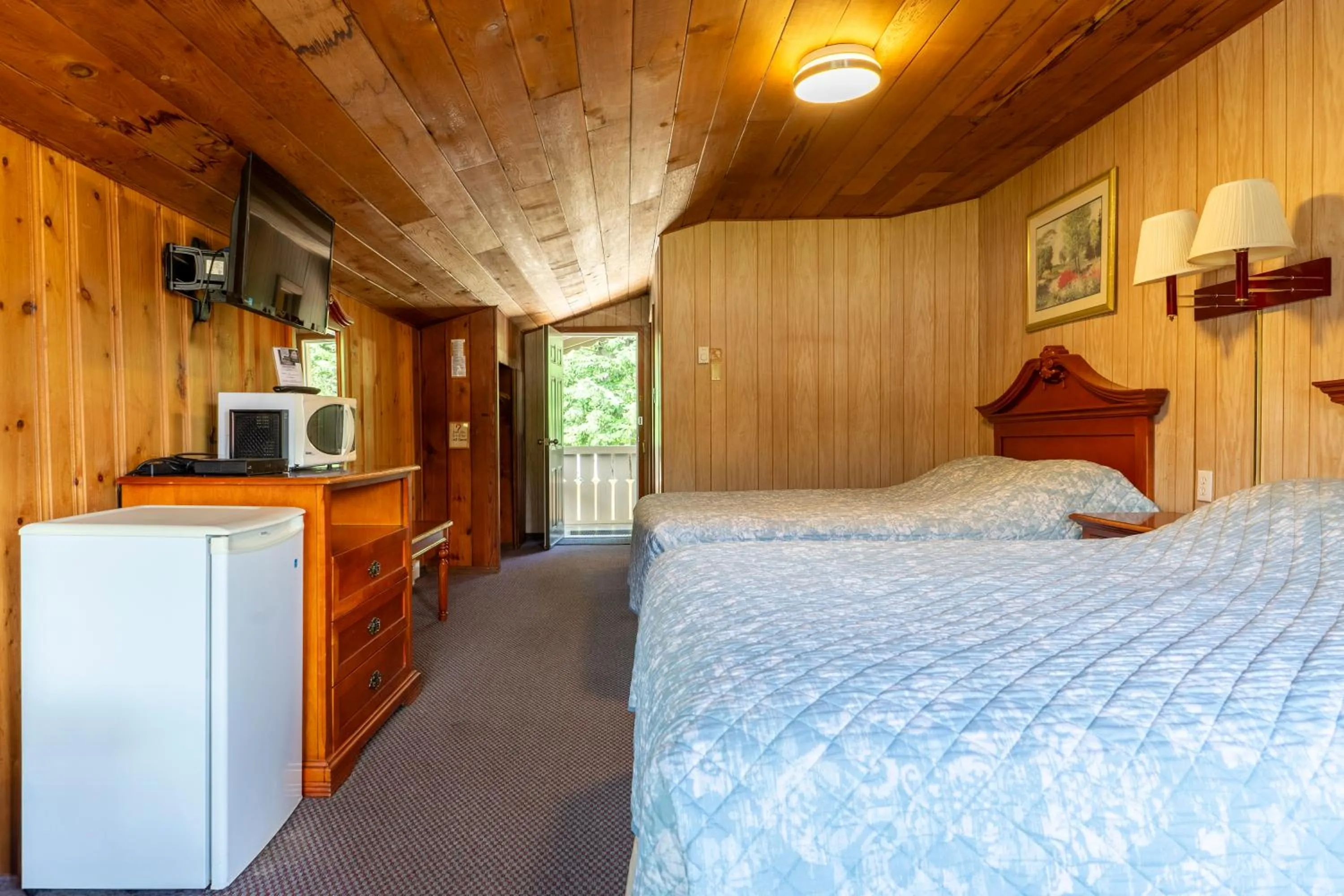 Bed in Richca Chalets Resort