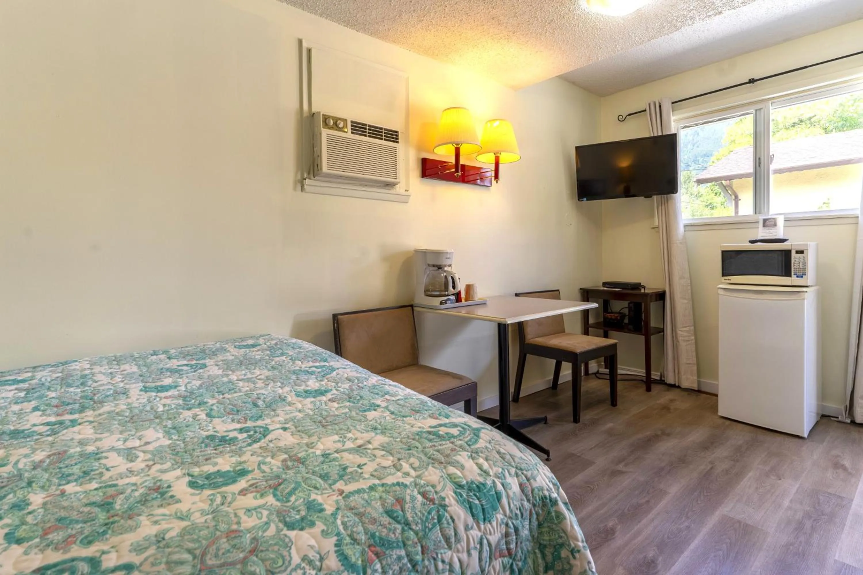 Bed in Richca Chalets Resort