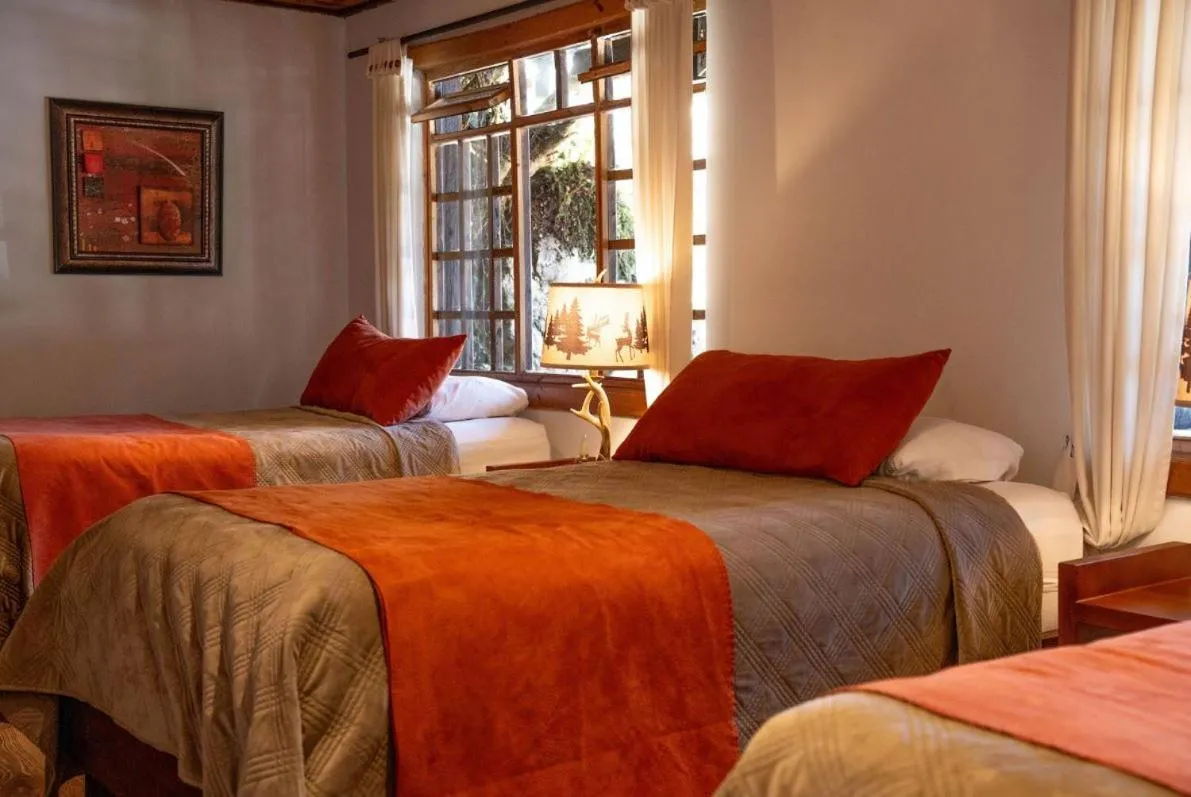 Bed in Hacienda Hostería Dos Chorreras