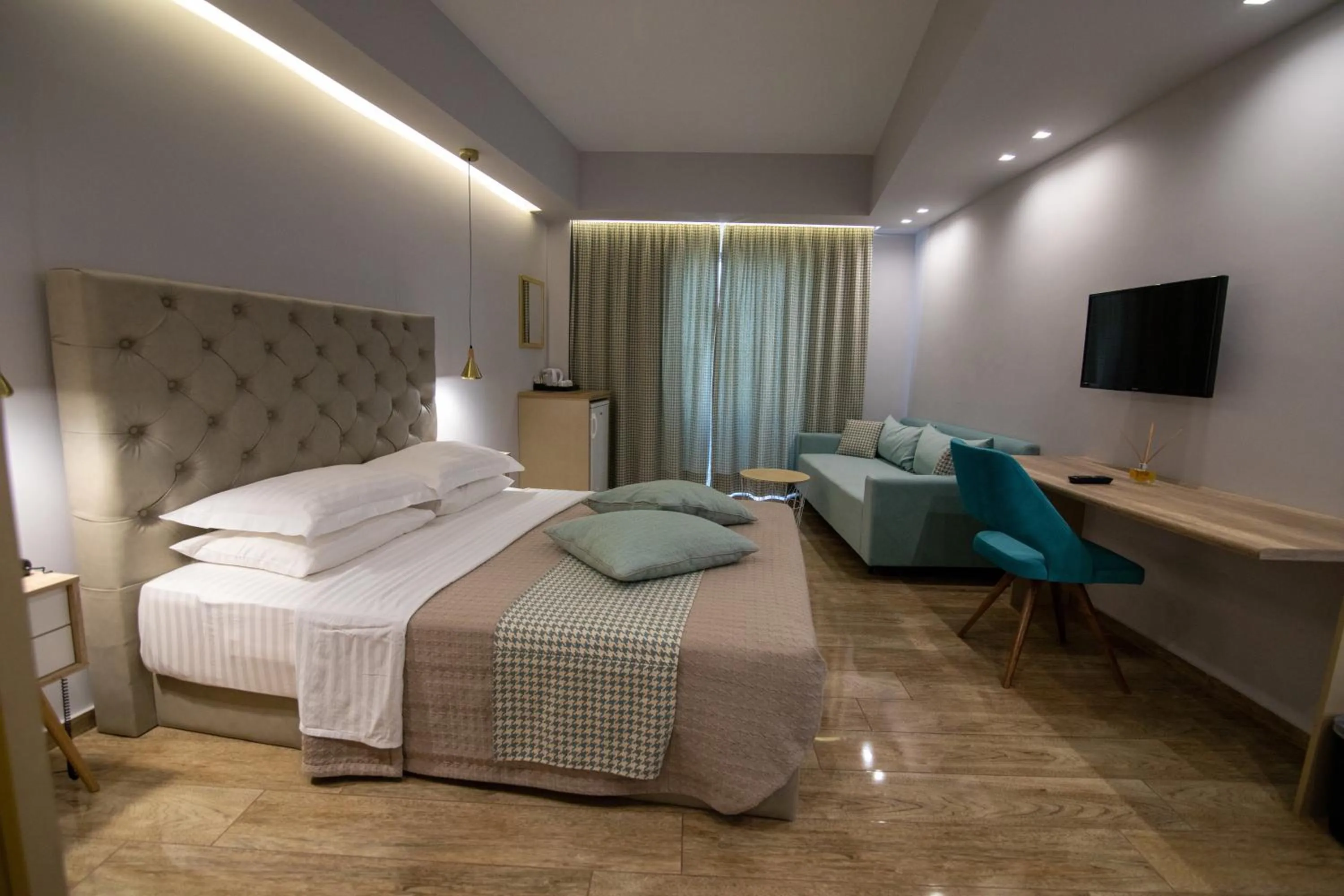 Photo of the whole room, Bed in Aianteion Bay Luxury Hotel & Suites