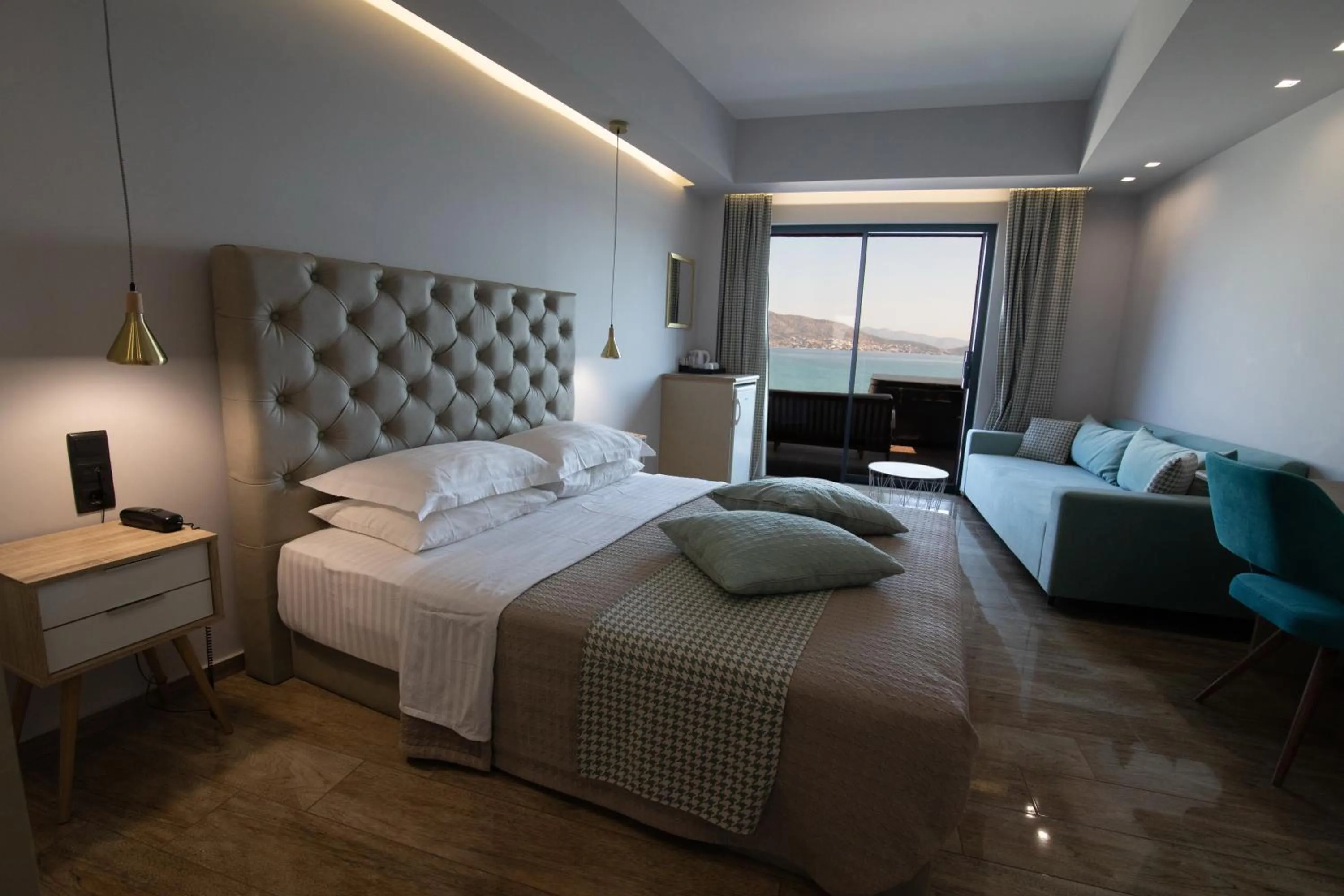 Photo of the whole room, Bed in Aianteion Bay Luxury Hotel & Suites
