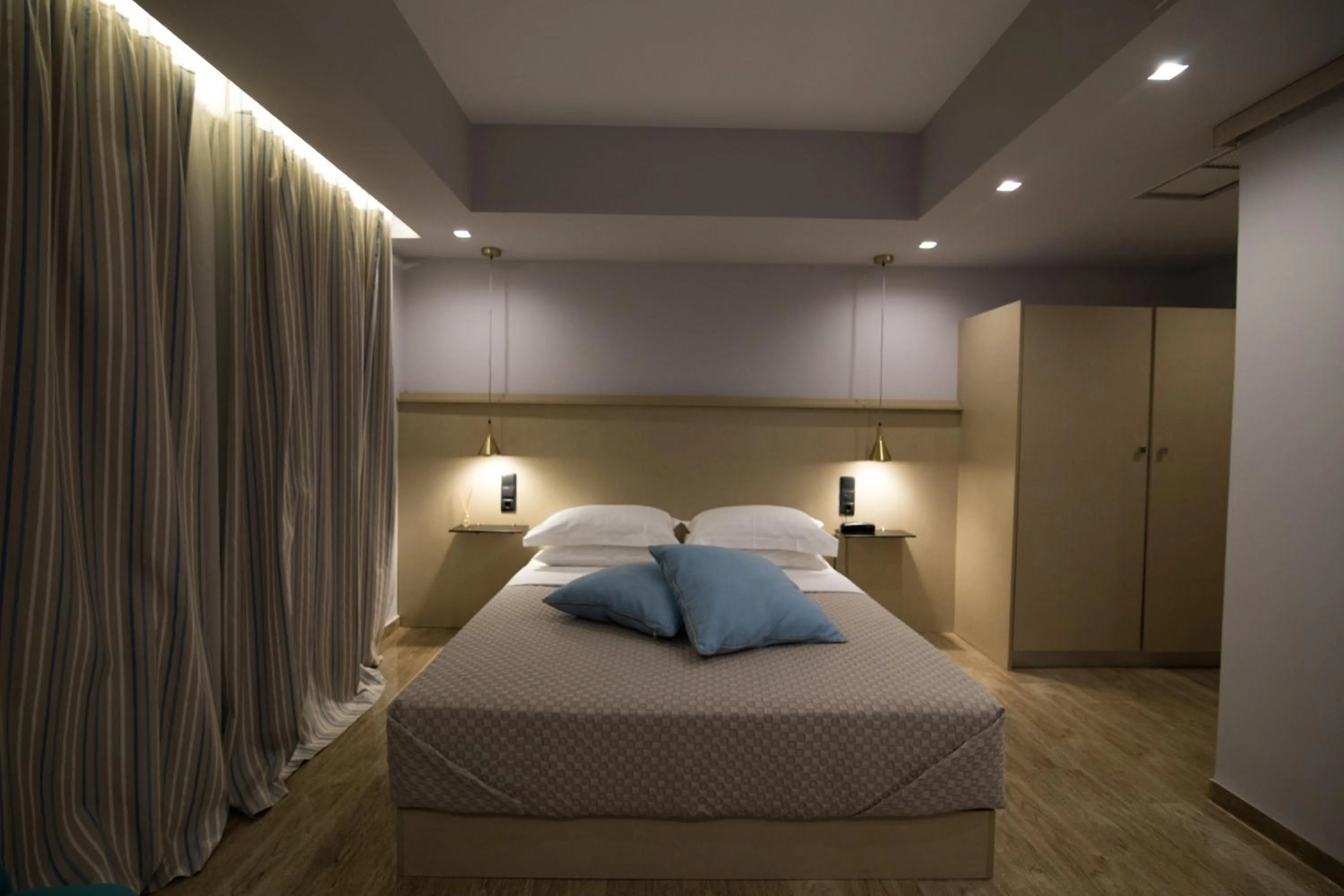 Photo of the whole room, Bed in Aianteion Bay Luxury Hotel & Suites