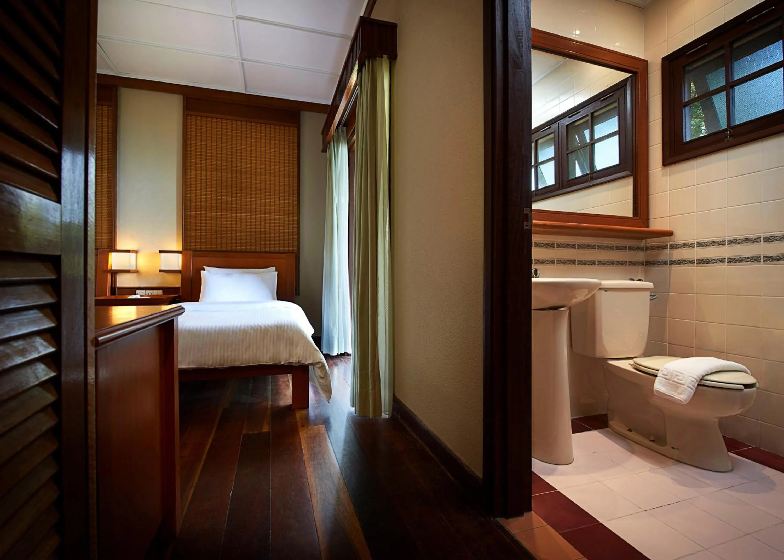 Toilet, Bed in Redang Island Resort
