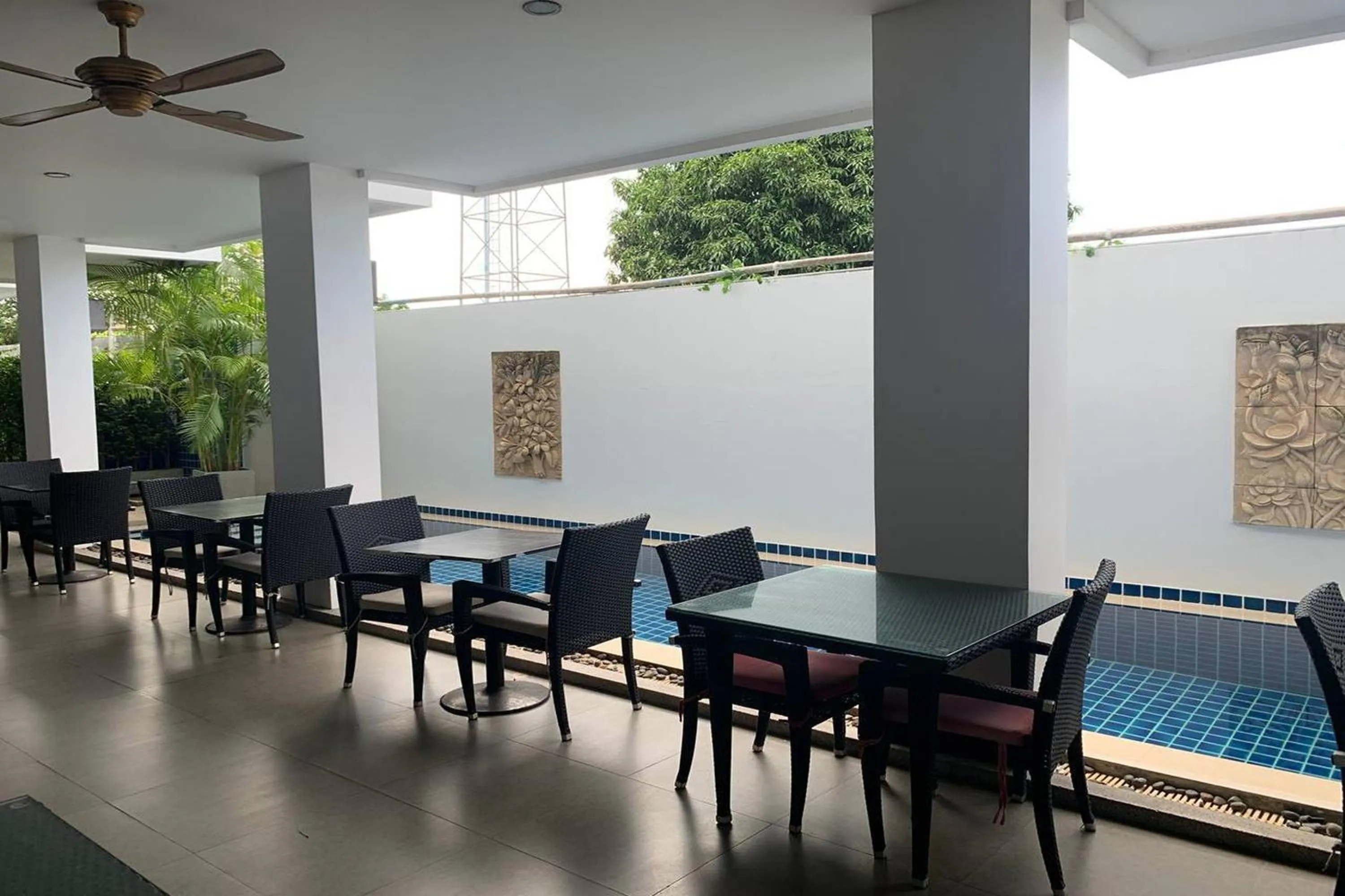 Living room in One World One Home Naiharn Hotel