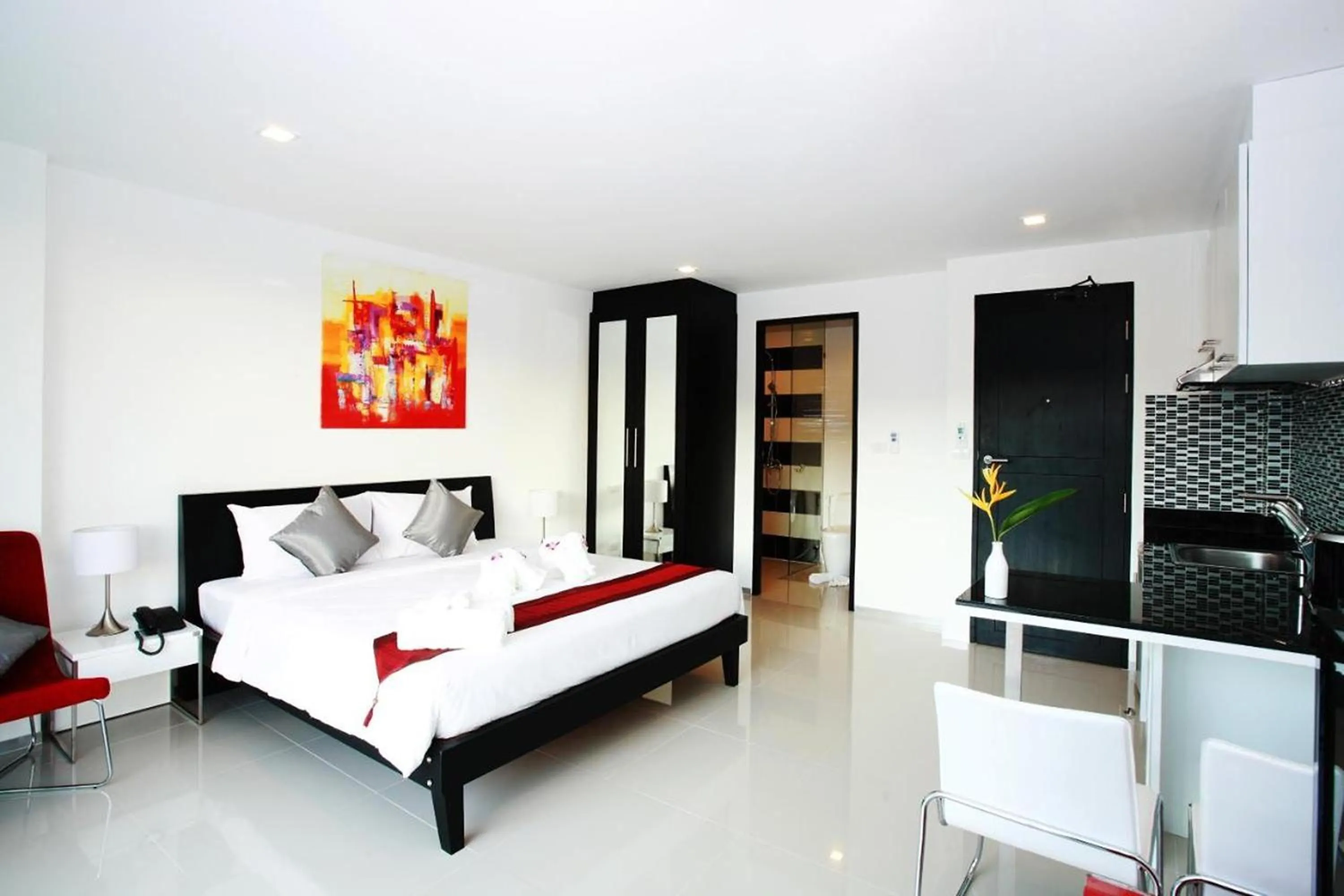 Bed in One World One Home Naiharn Hotel