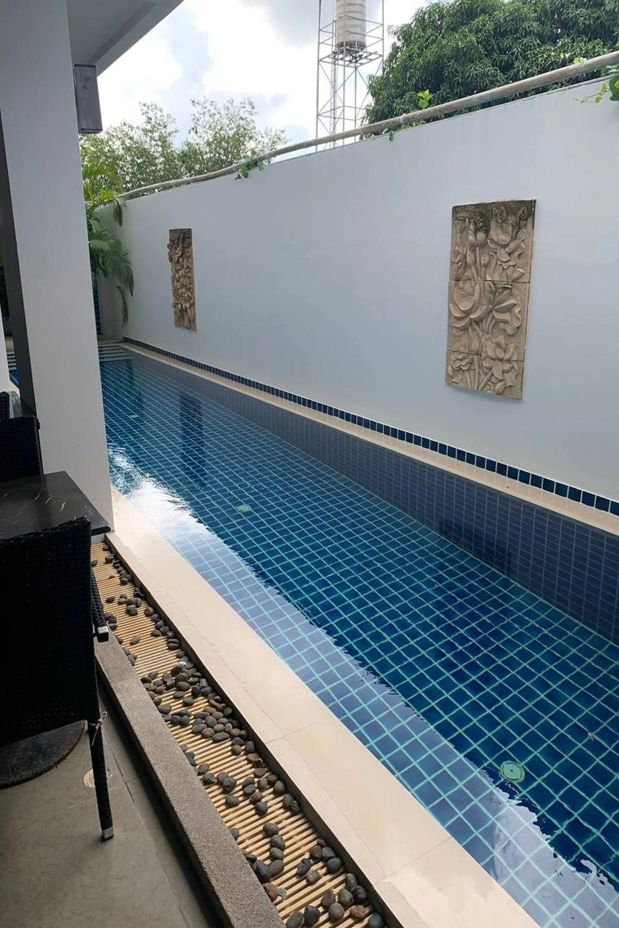 Pool view in One World One Home Naiharn Hotel