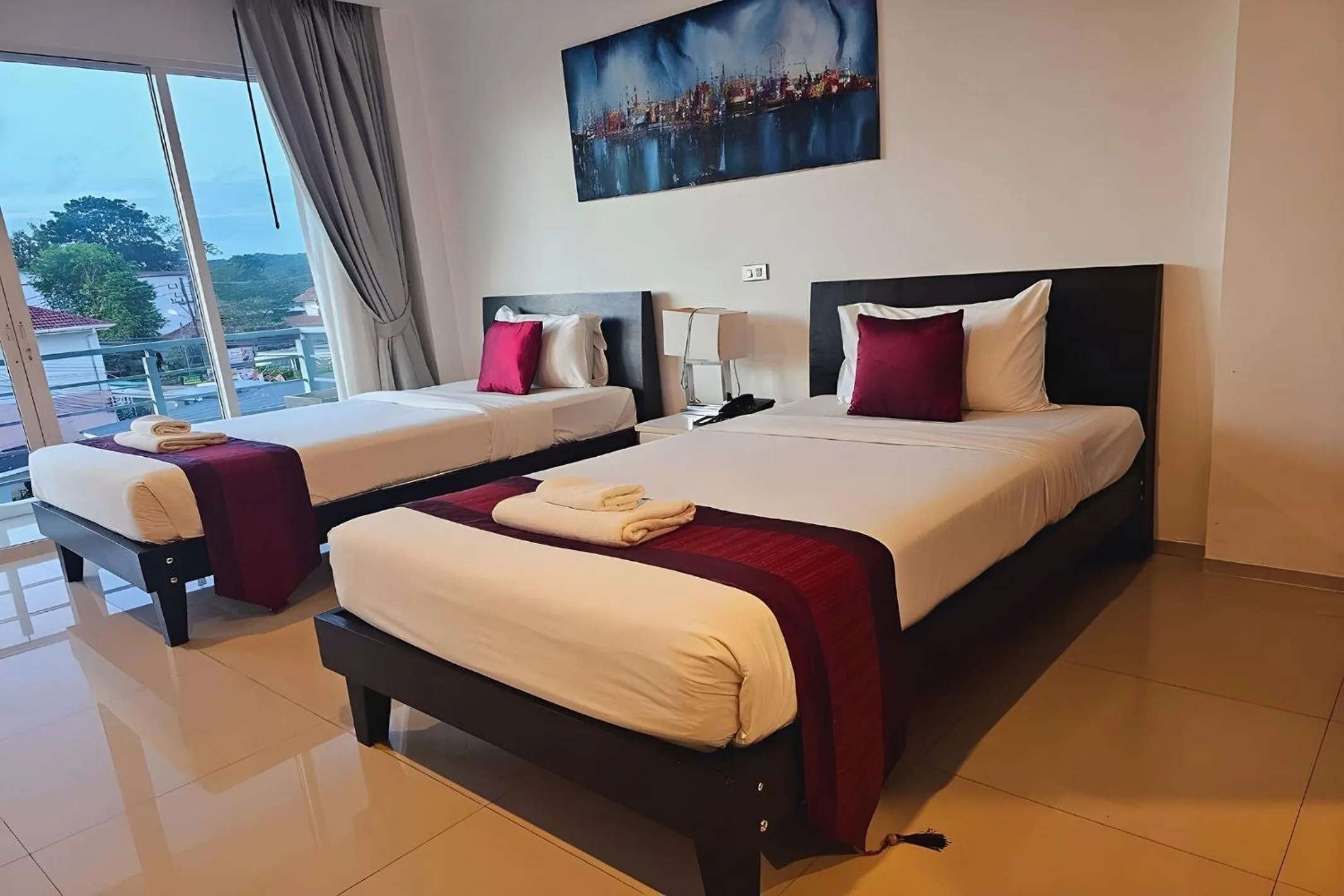 Bed in One World One Home Naiharn Hotel