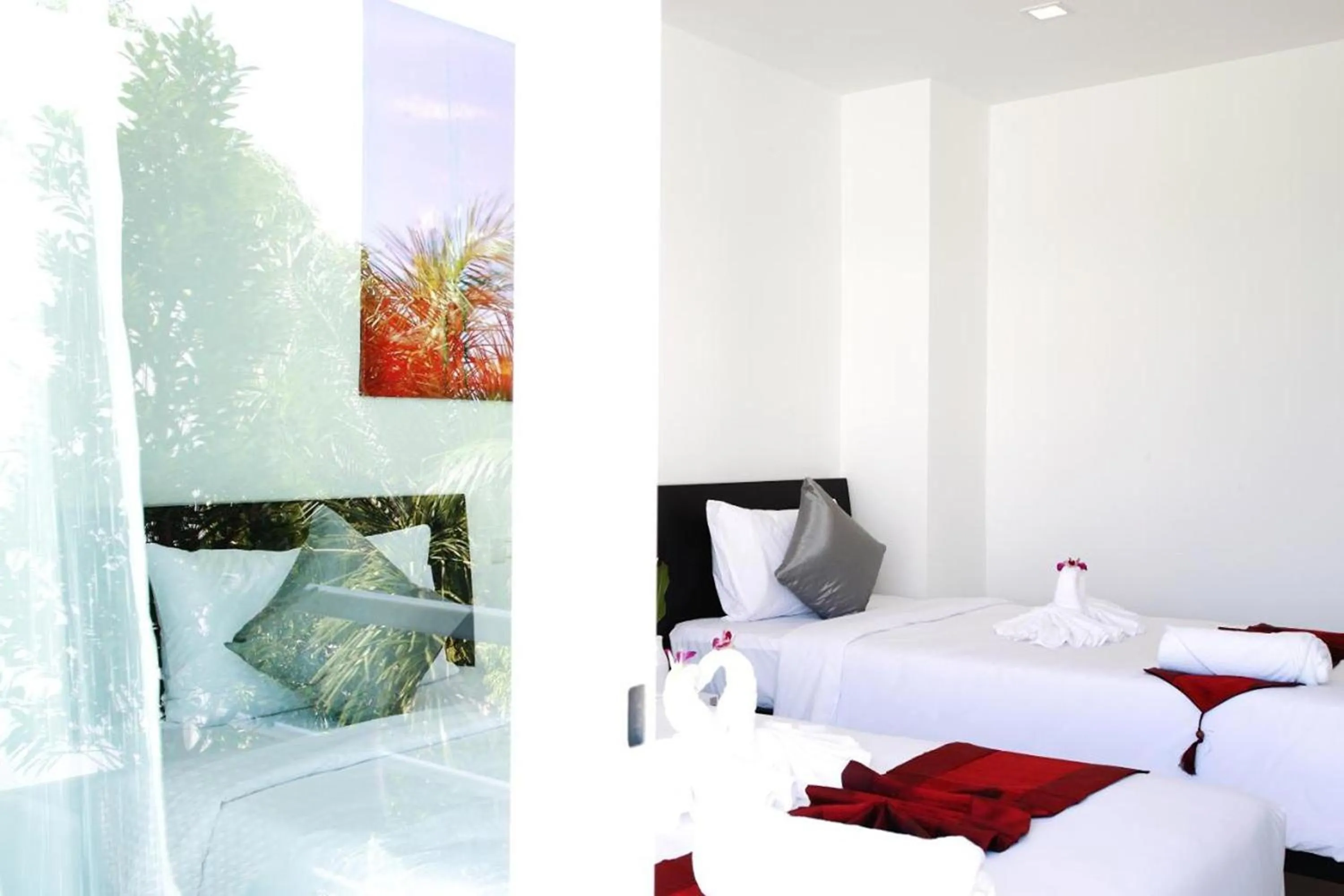 Bed in One World One Home Naiharn Hotel