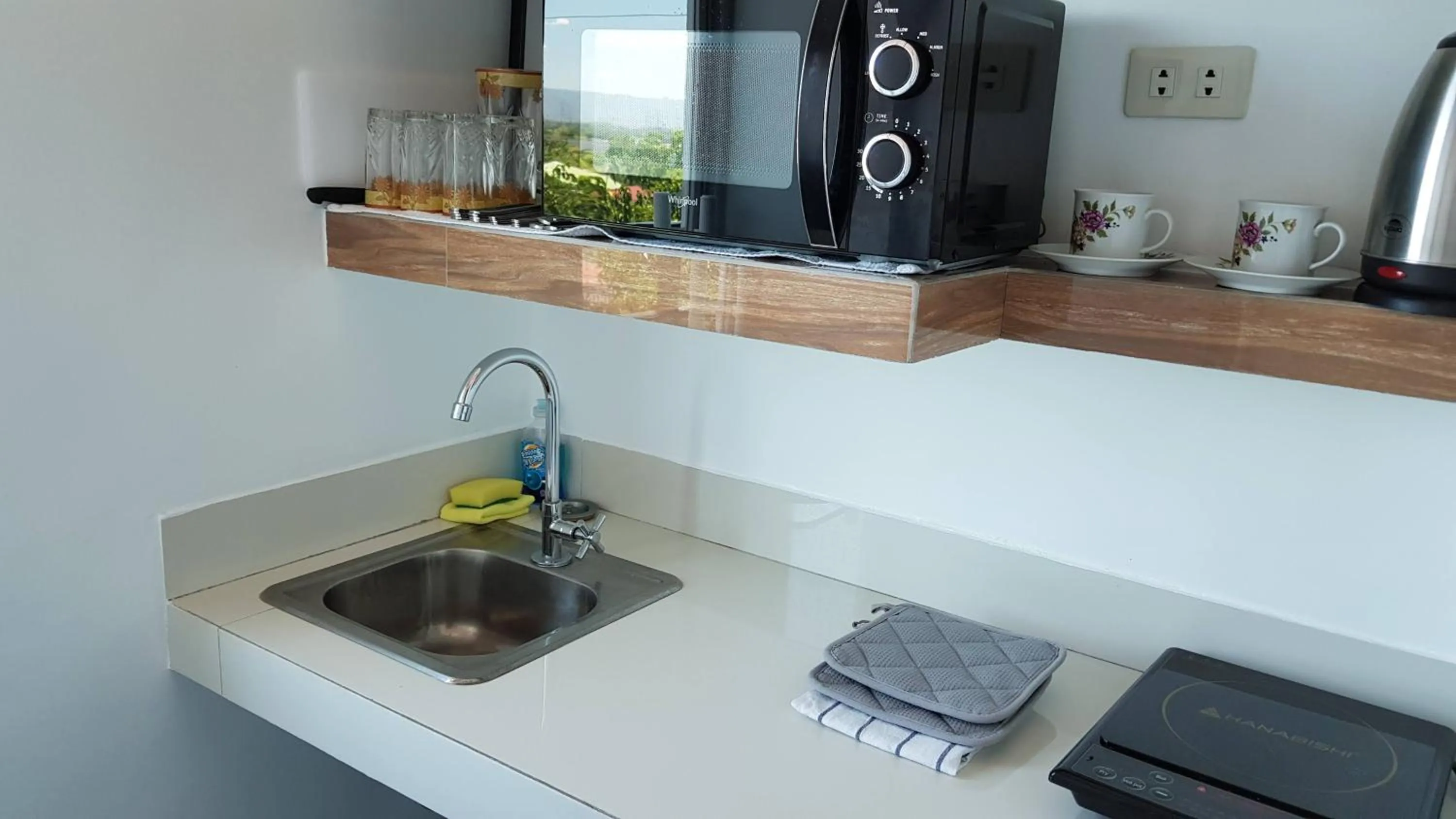 Kitchen or kitchenette in Italy Condotel Darasa