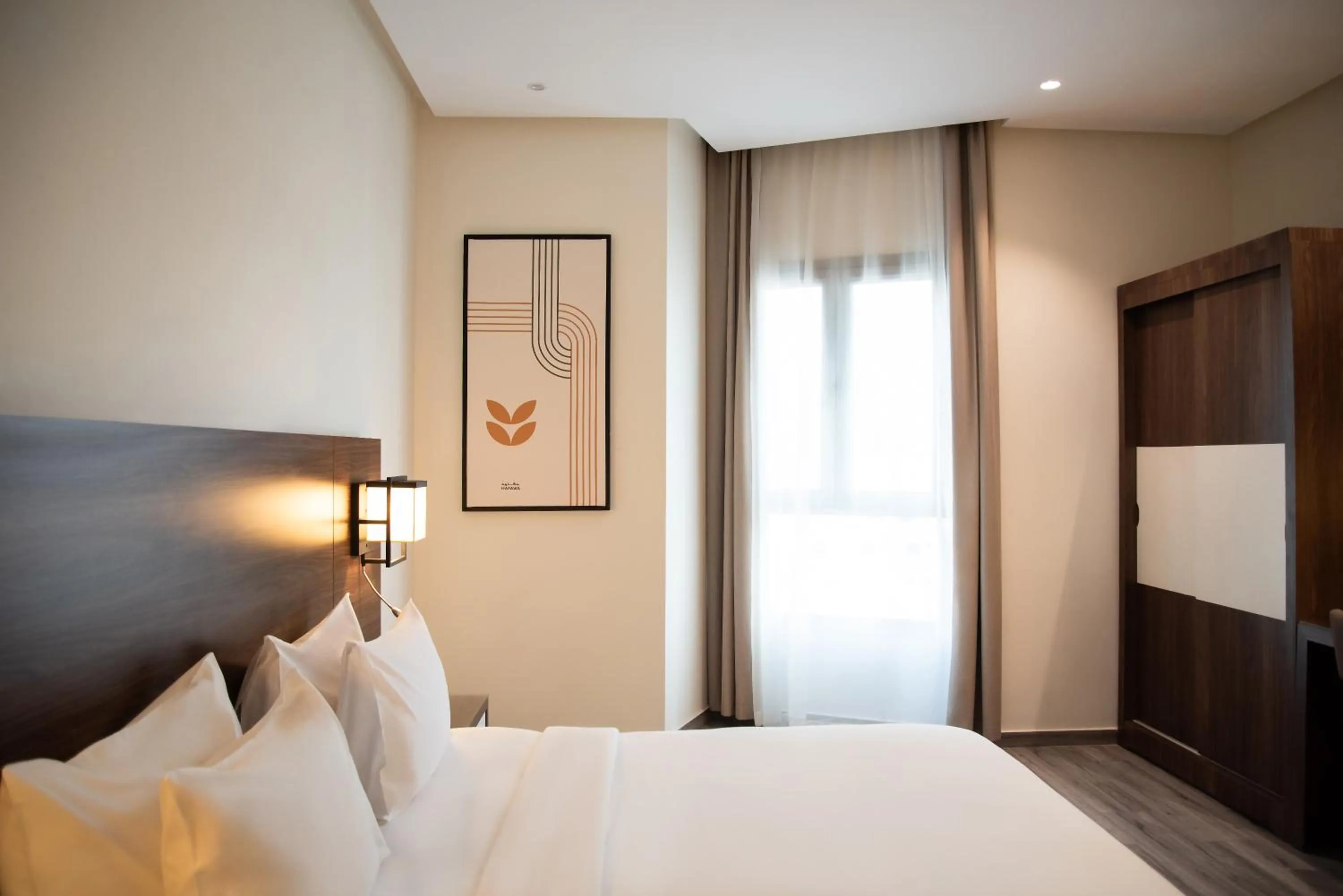 Bed in Hafawah Suites