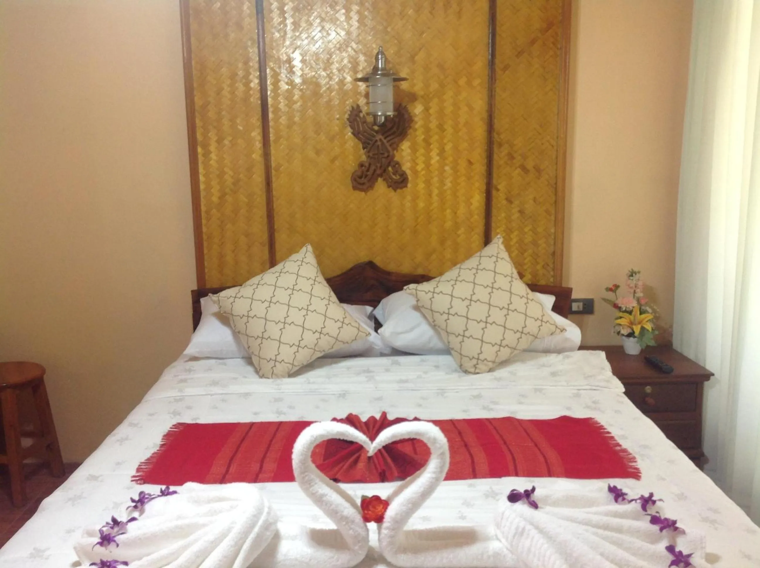 Bed in Ruan Mai Naiyang Beach Resort