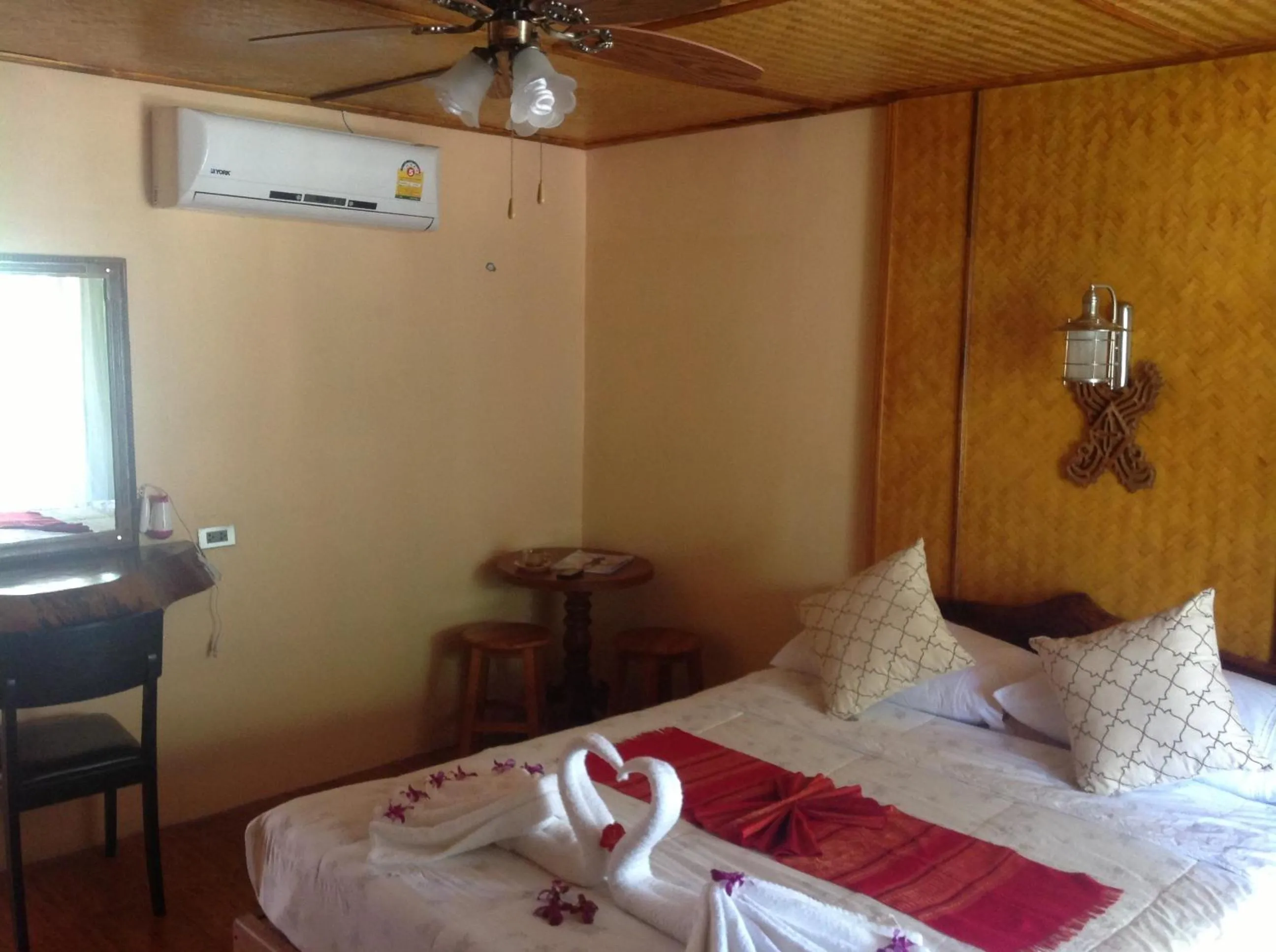 Photo of the whole room, Bed in Ruan Mai Naiyang Beach Resort