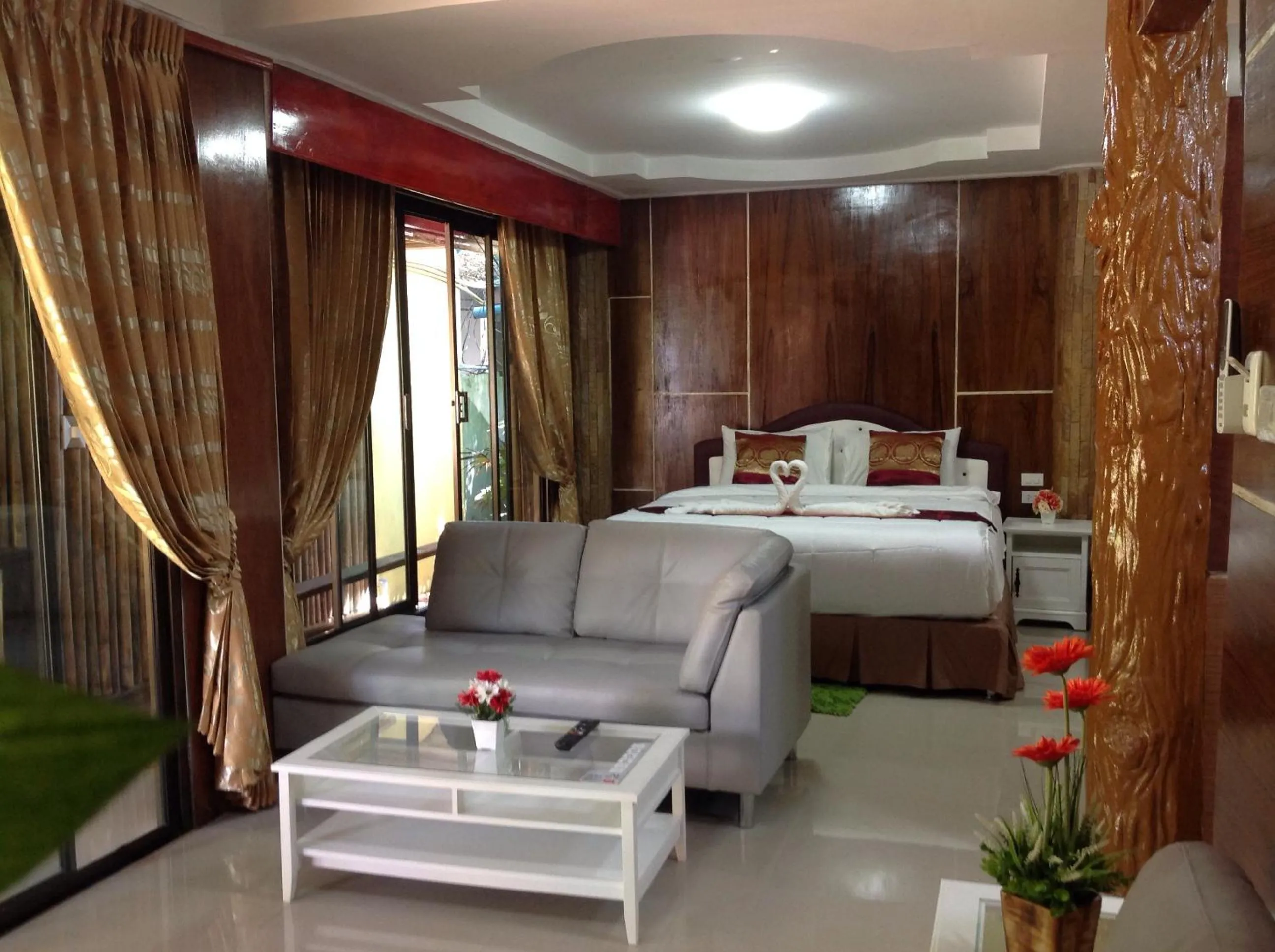 Bed in Ruan Mai Naiyang Beach Resort