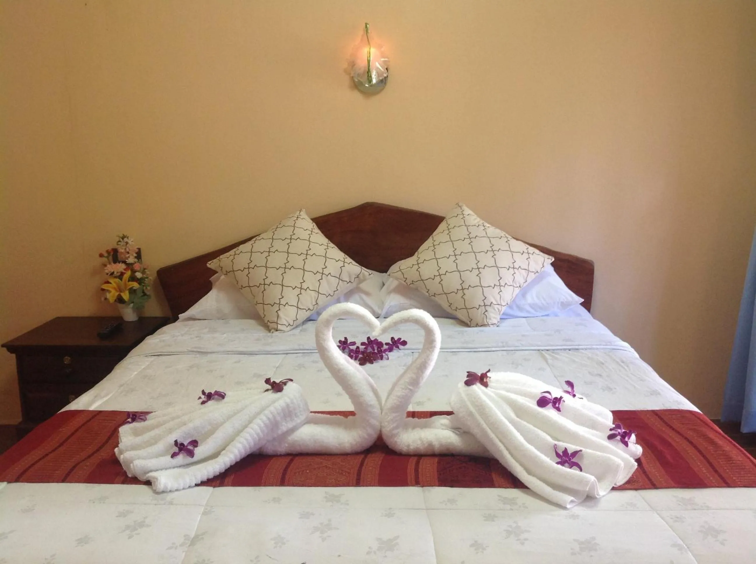 Bed in Ruan Mai Naiyang Beach Resort