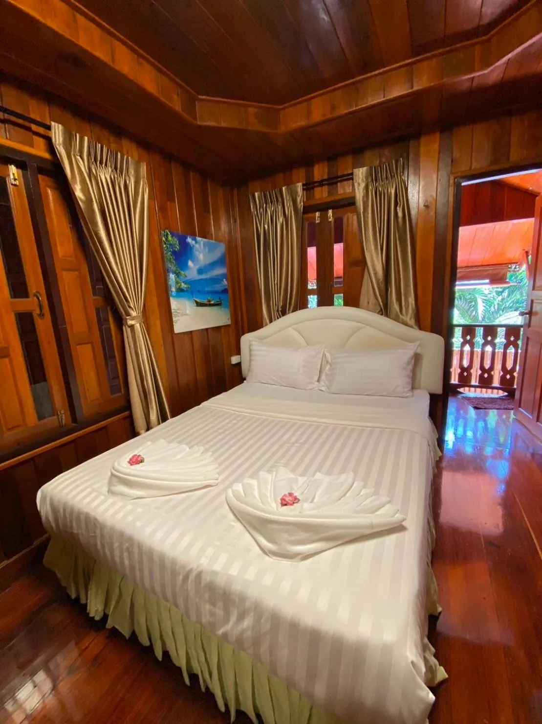 Bed in Ruan Mai Naiyang Beach Resort