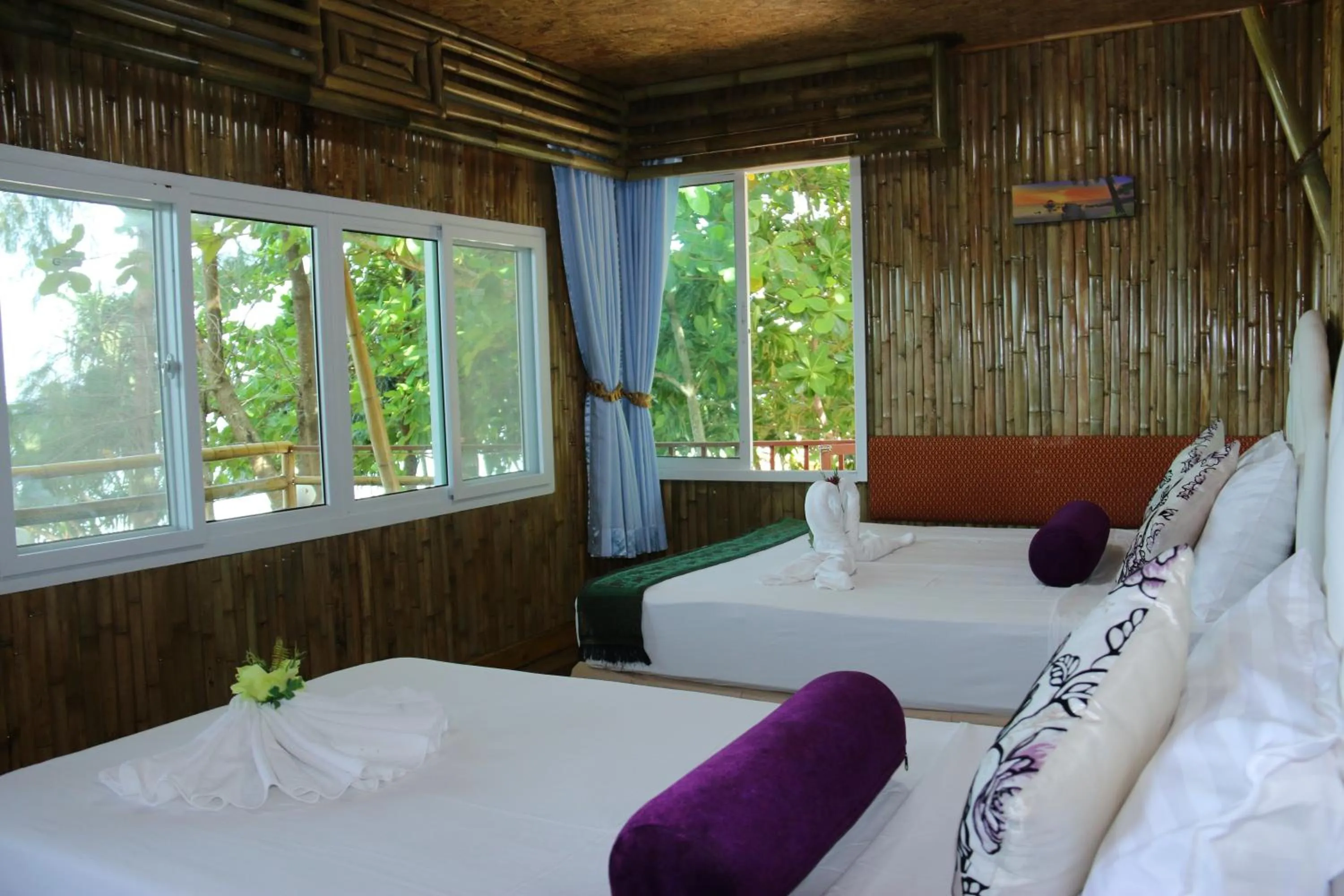 Bed in Ruan Mai Naiyang Beach Resort