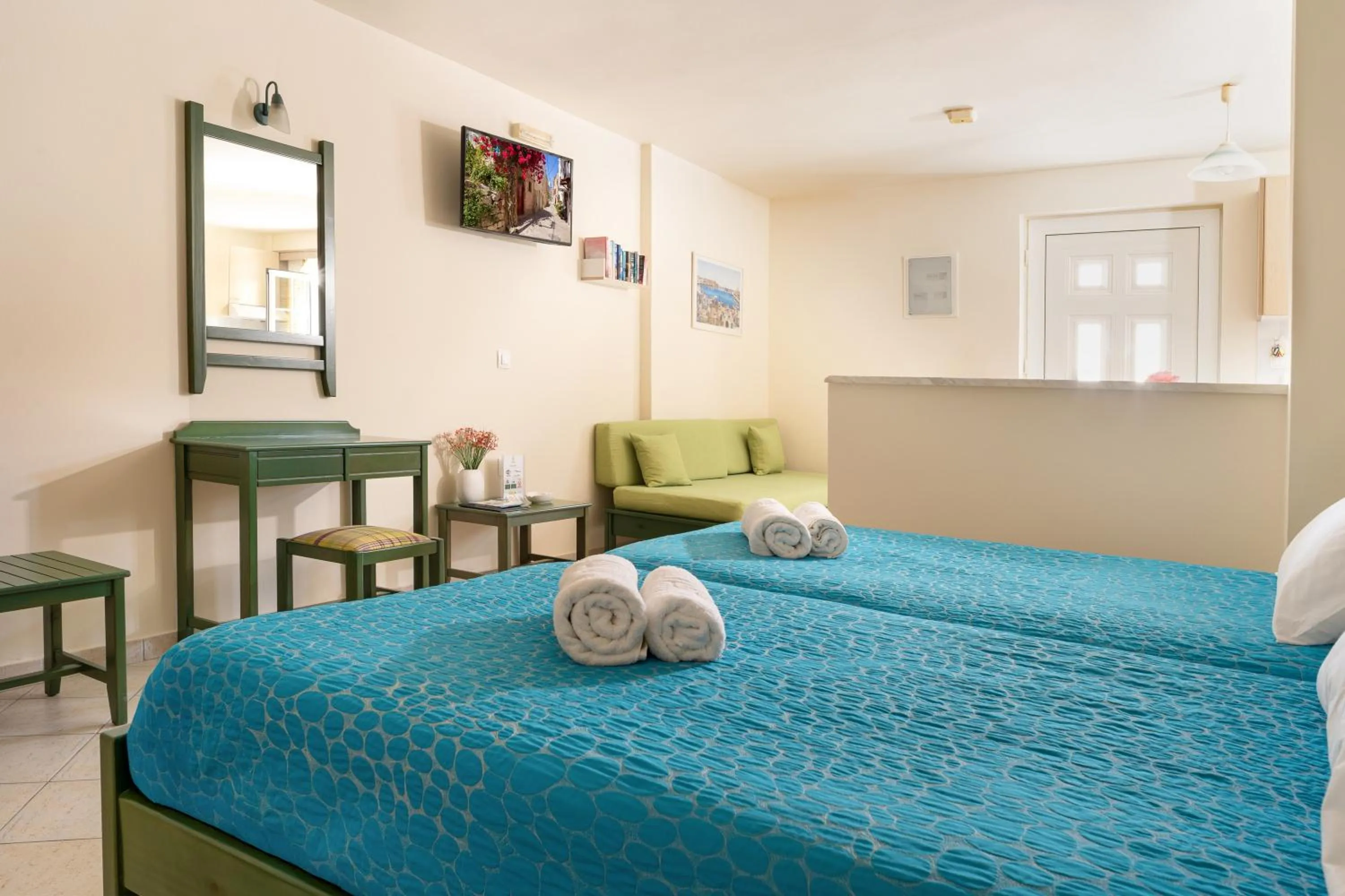 Bed in Armonia Apartments