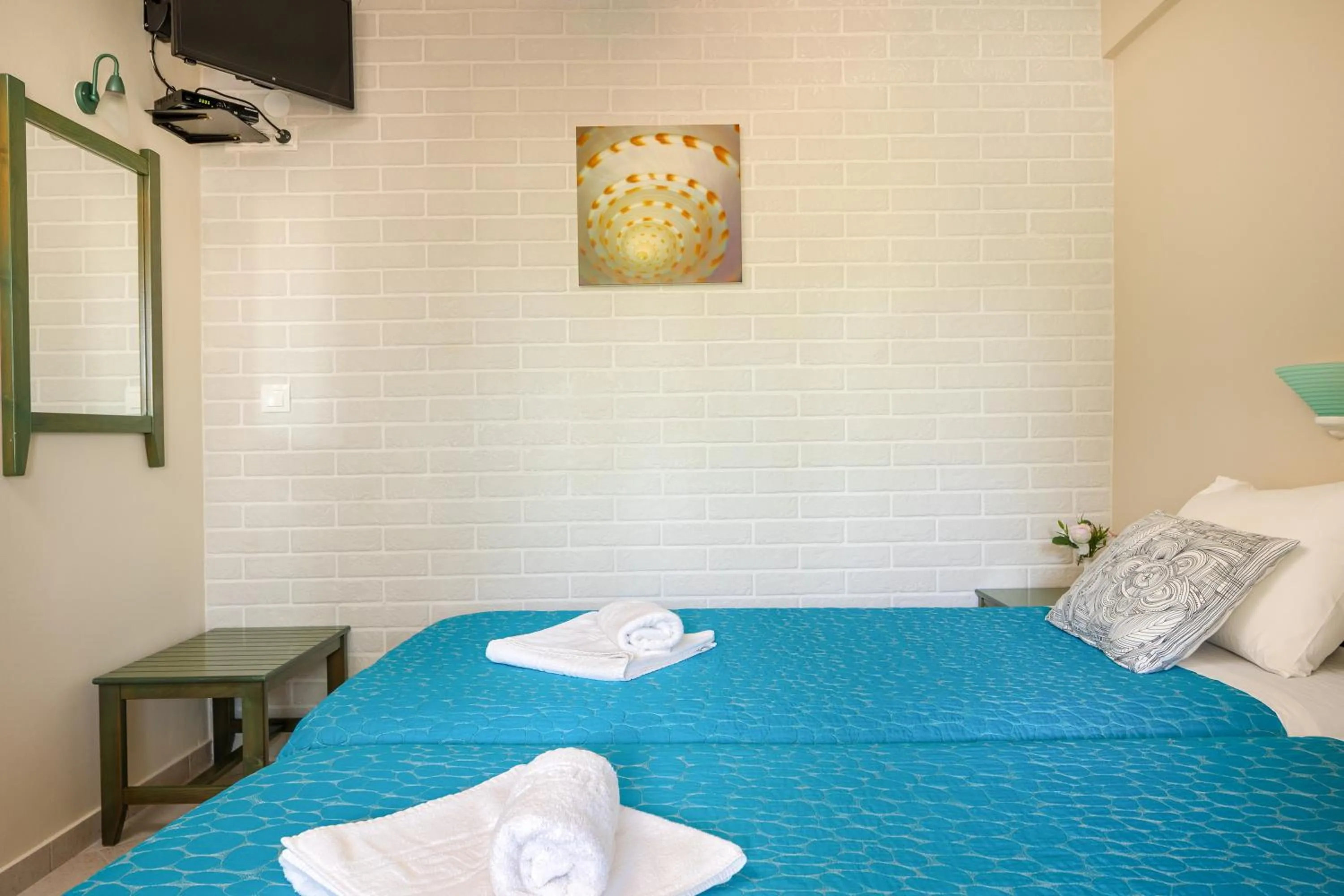 Bed in Armonia Apartments