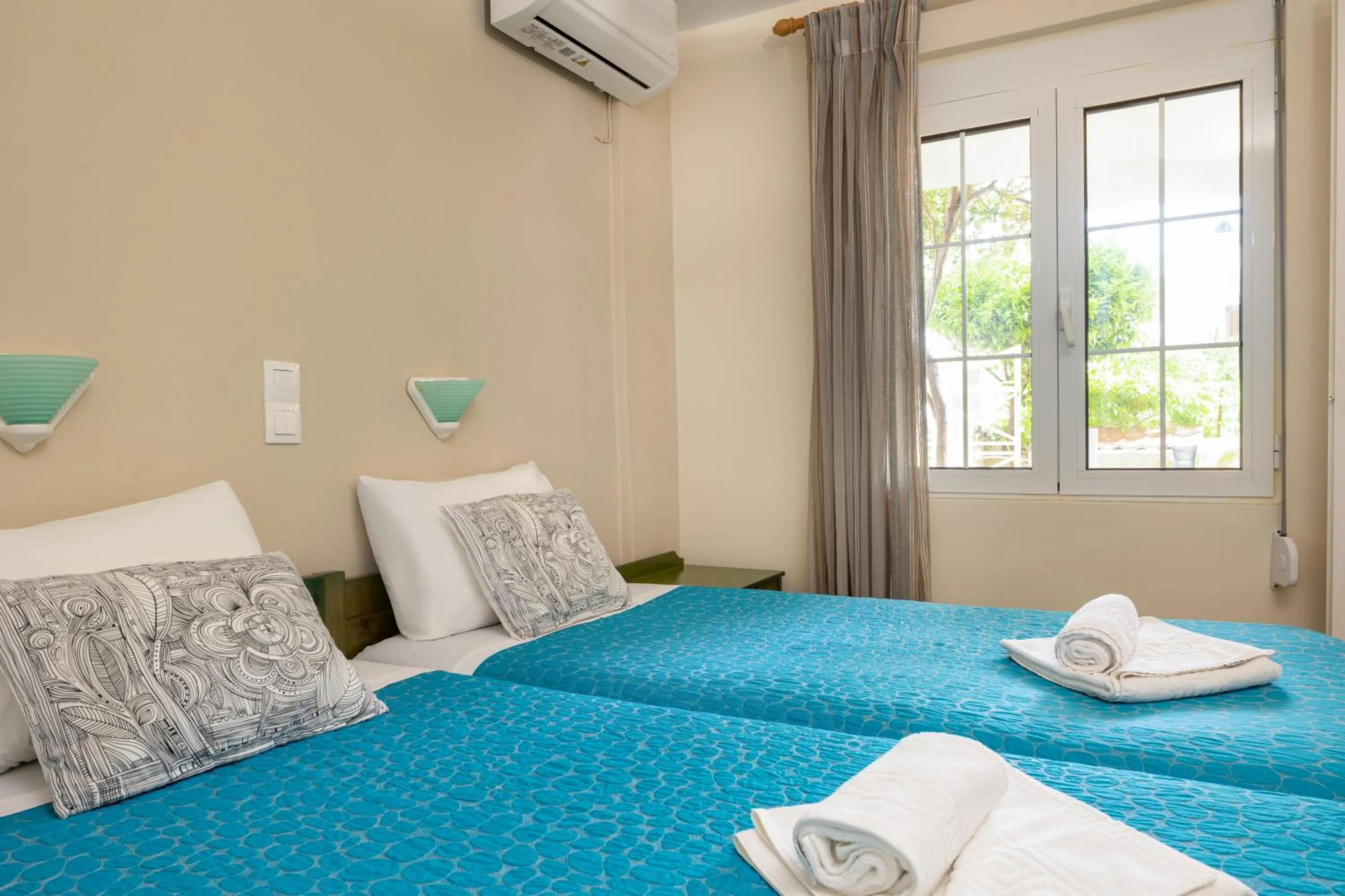 Bed in Armonia Apartments