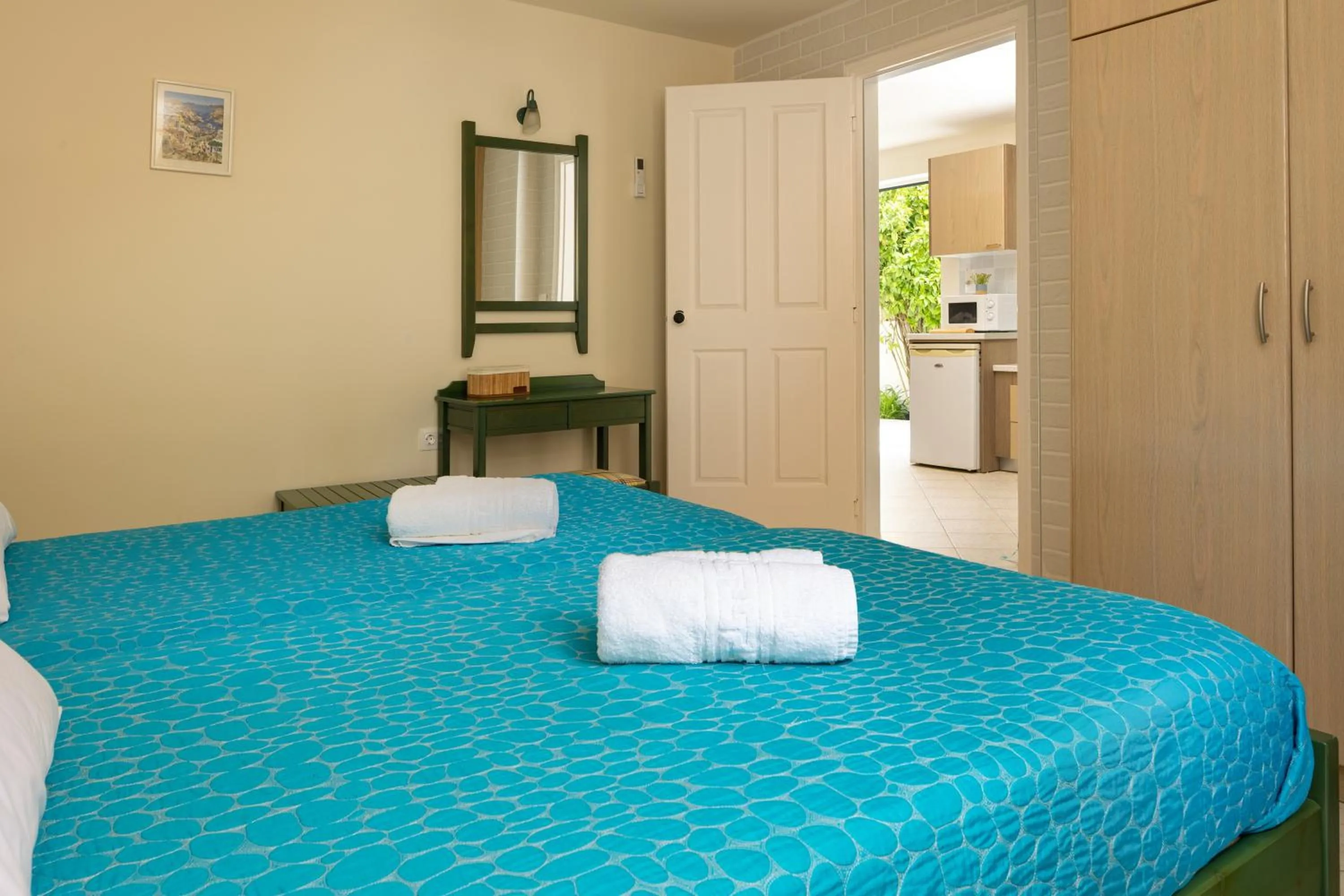 Bed in Armonia Apartments