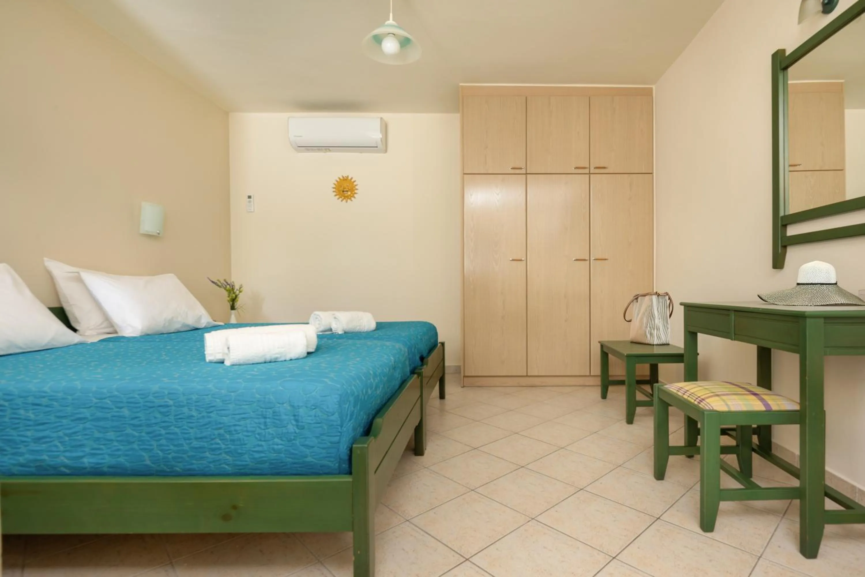 Bed in Armonia Apartments