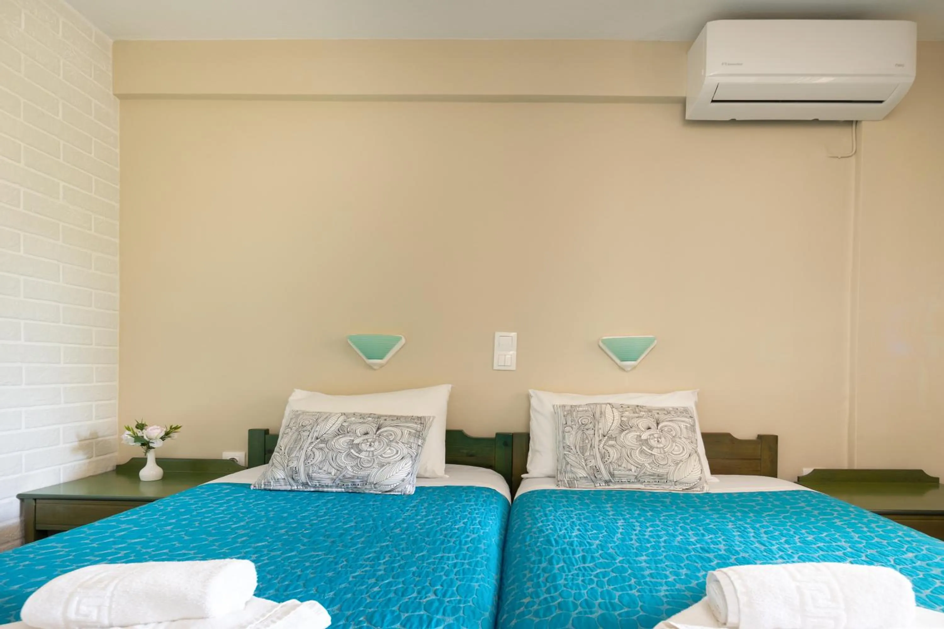 Bed in Armonia Apartments