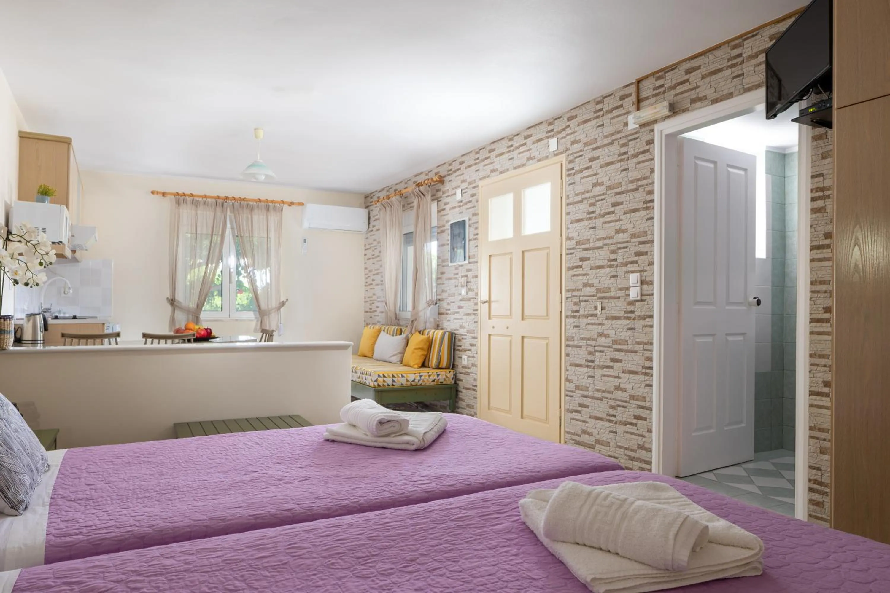 Bed in Armonia Apartments