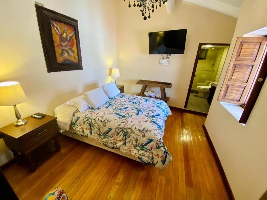 Bed in Cusco Hotel Boutique