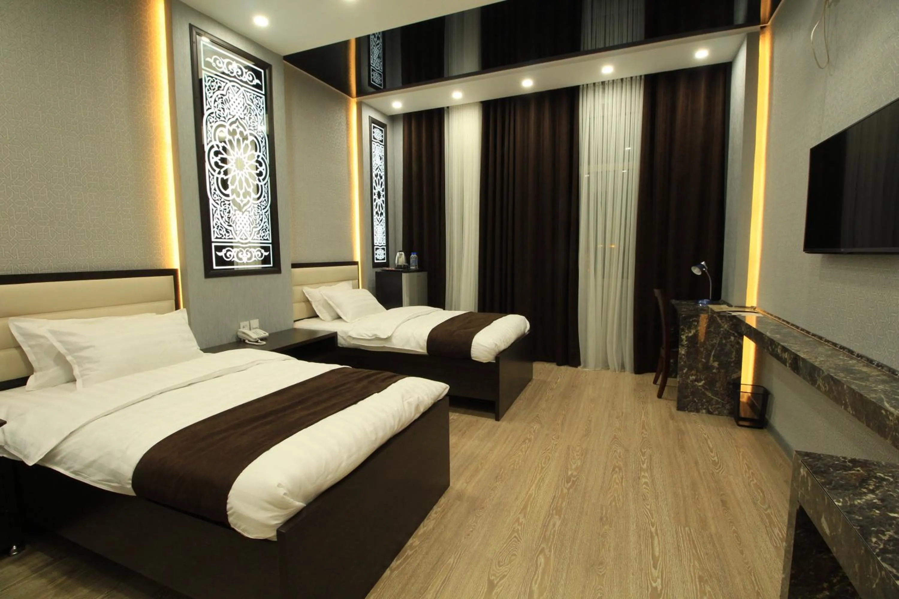 Bed in SAFIR BUSINESS HOTEL o