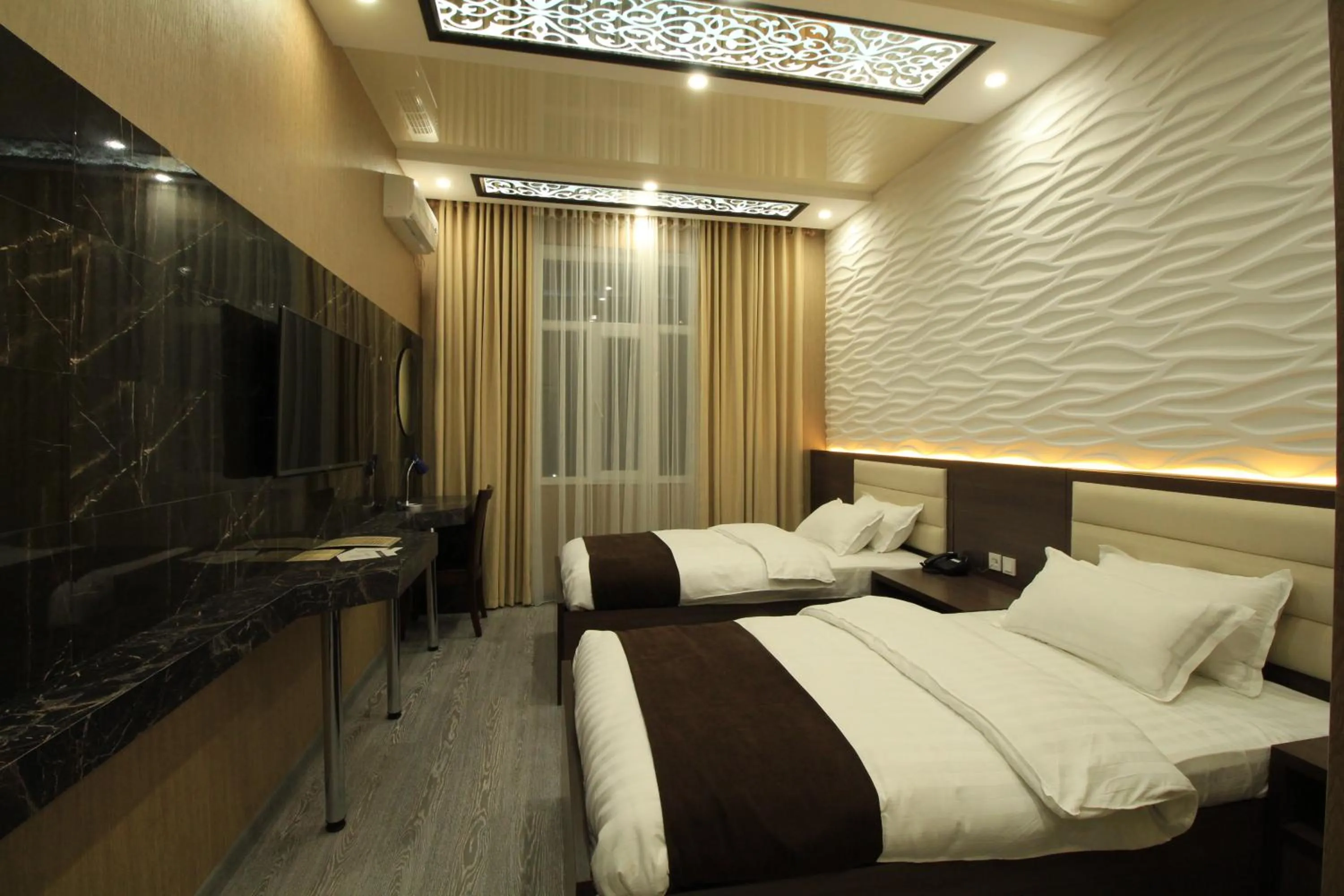 Bed in SAFIR BUSINESS HOTEL o