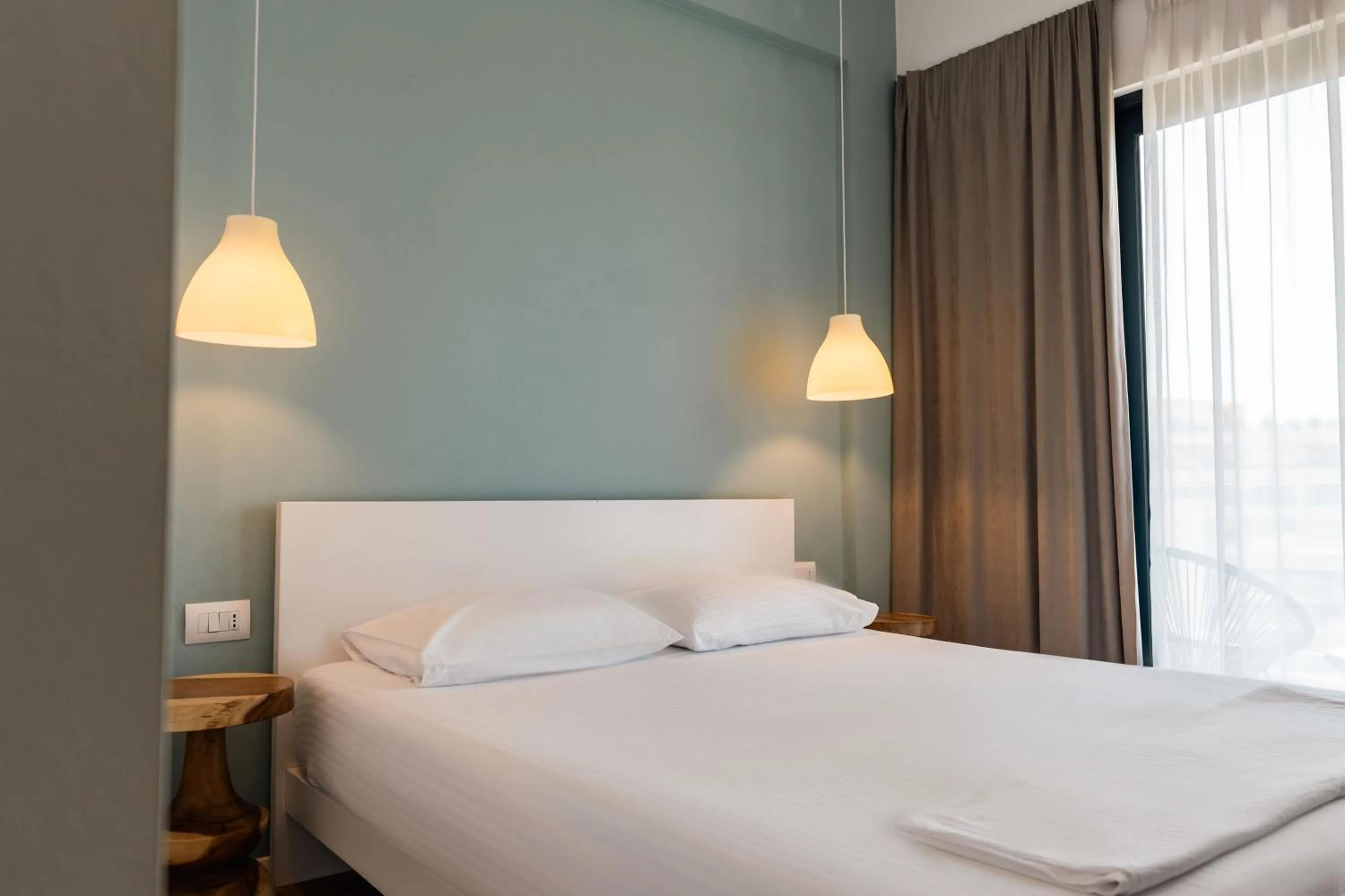 Bed in Kanes Bohemian Boutique Hotel