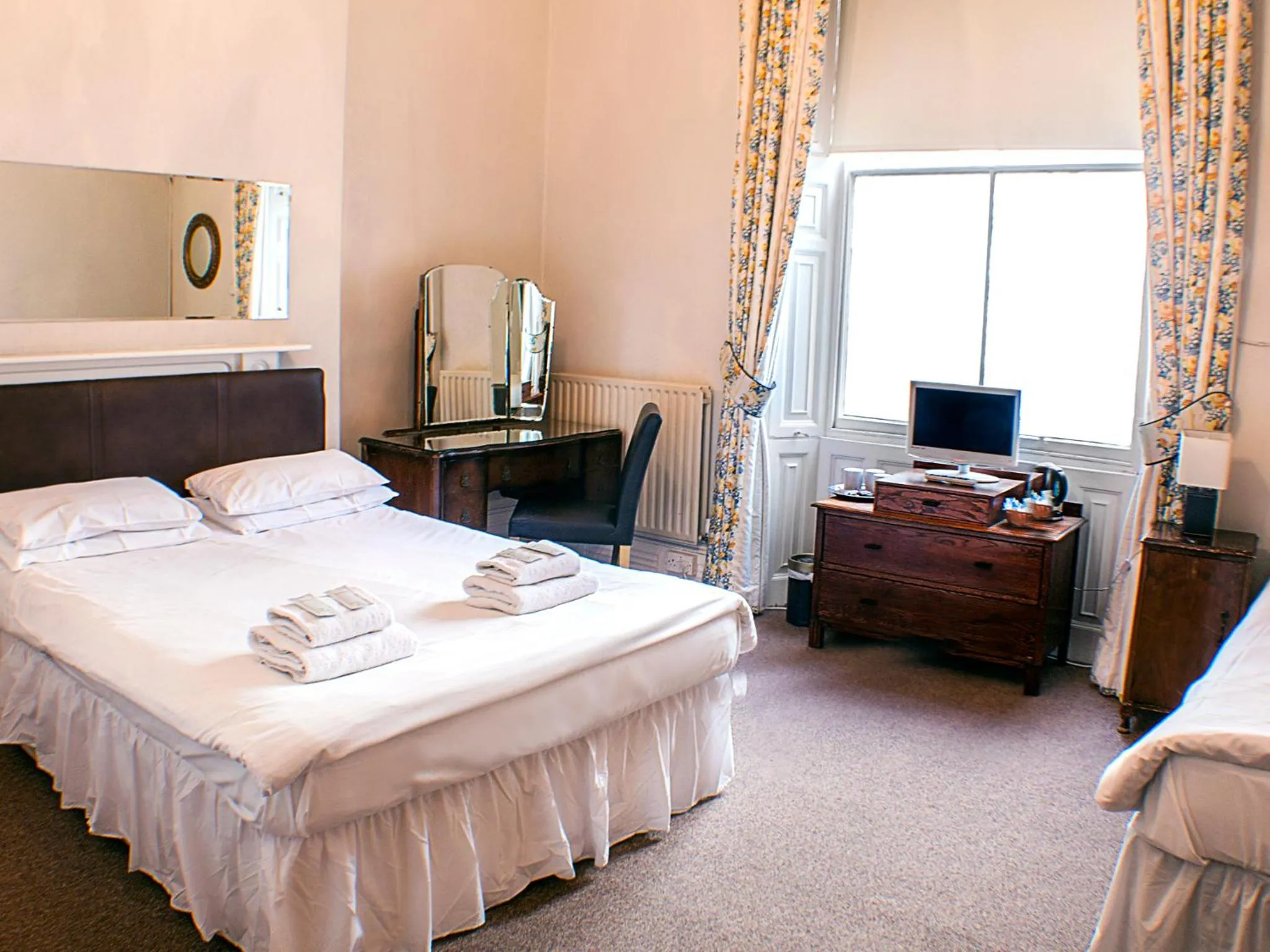 Bed in The Queensbury Hotel