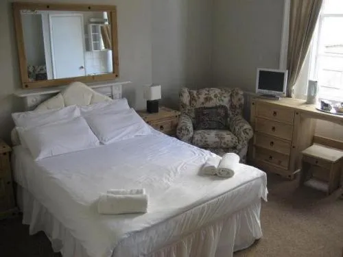 Bed in The Queensbury Hotel