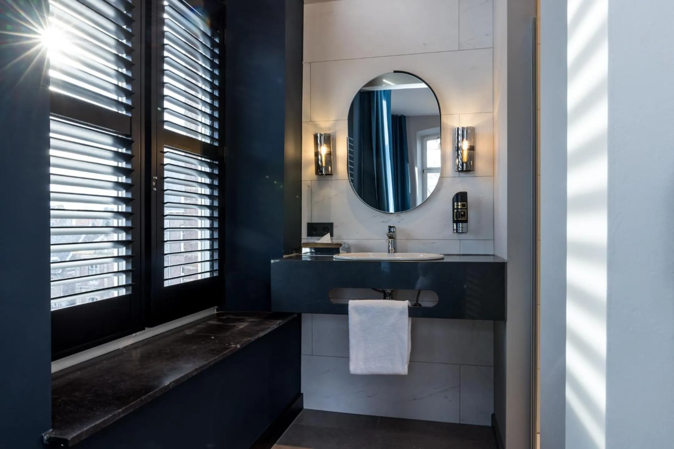 Bathroom in MERICI Hotel Sittard