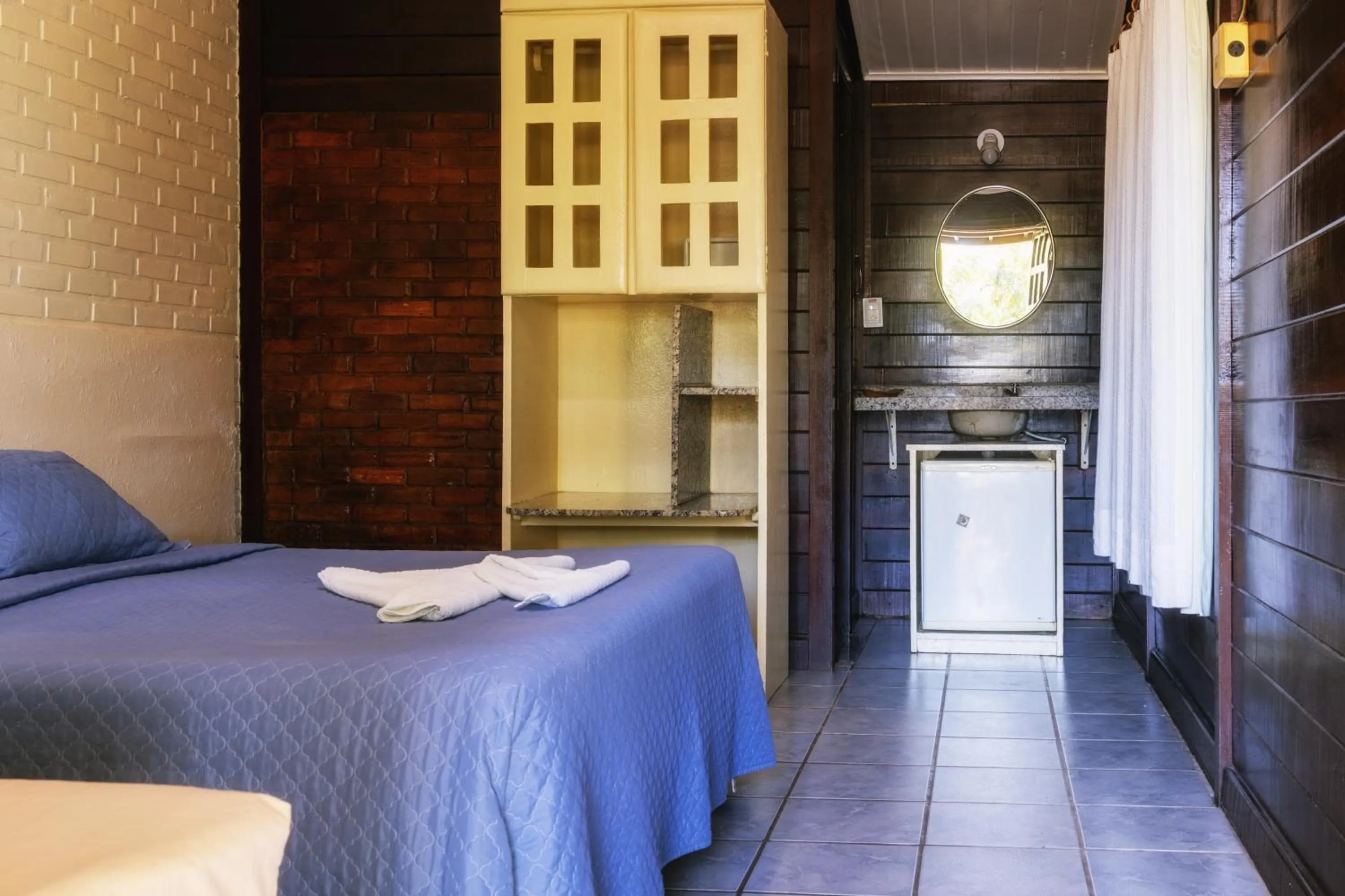 Bed in Pousada Mabuya